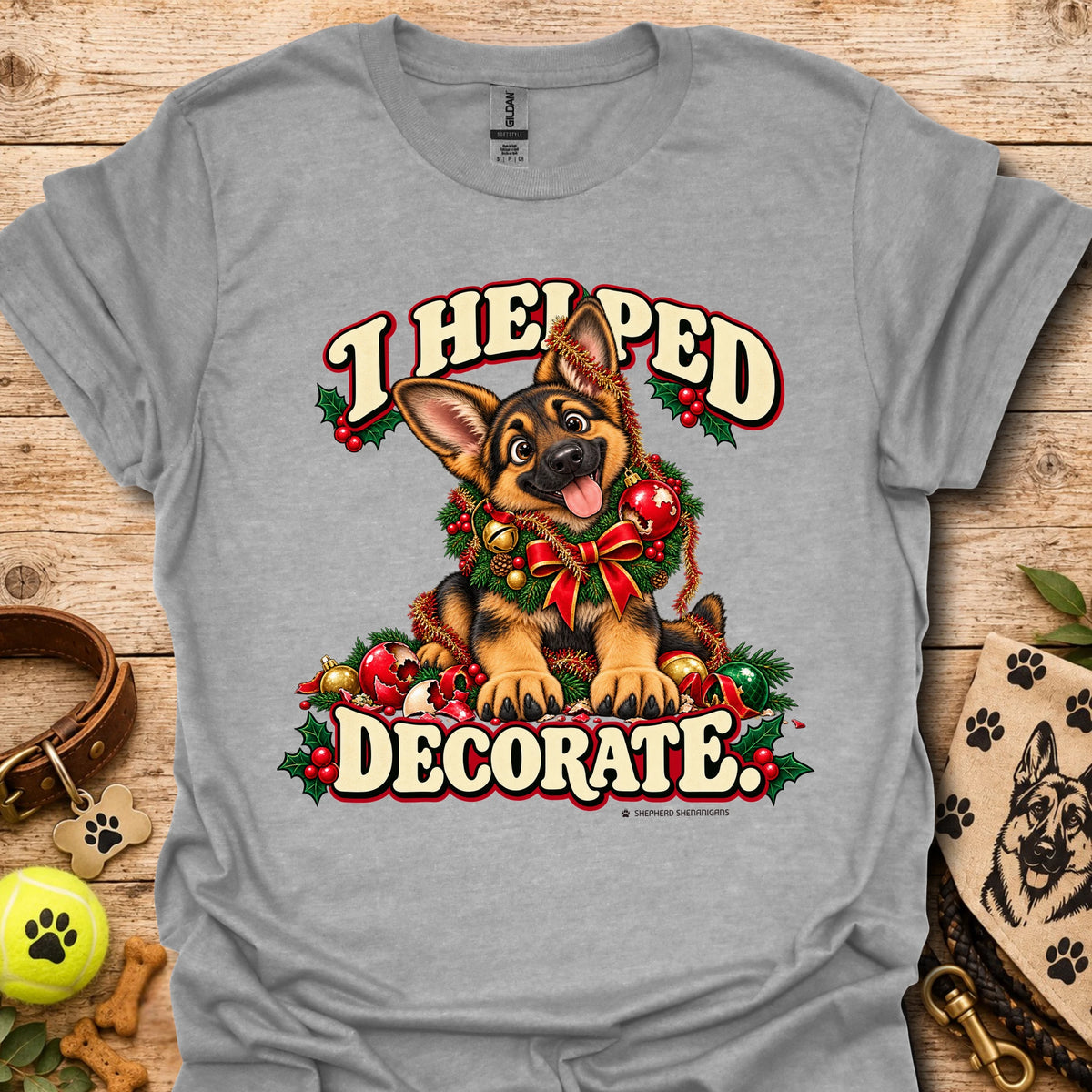 Heather gray T-shirt with festive cartoon dog and holiday text graphic on front