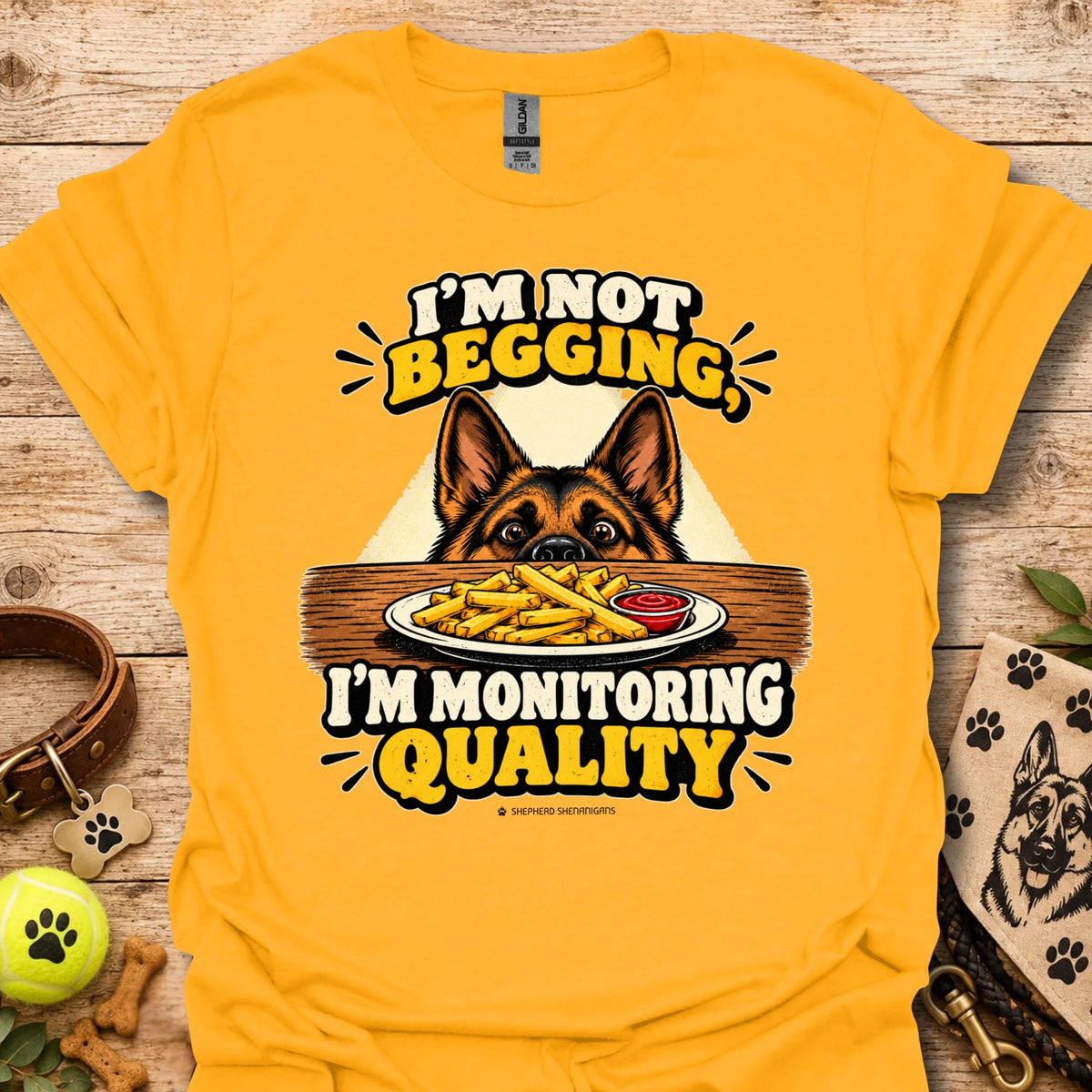 Mustard gold t-shirt with dog head and “I'm Not Begging” front graphic, “I'm Monitoring Quality”