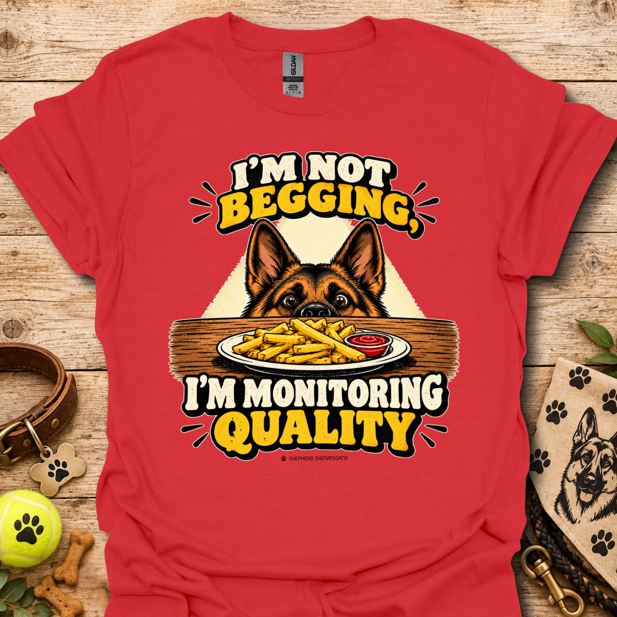 Red t-shirt with dog head and “I'm Not Begging” front graphic, “I'm Monitoring Quality”
