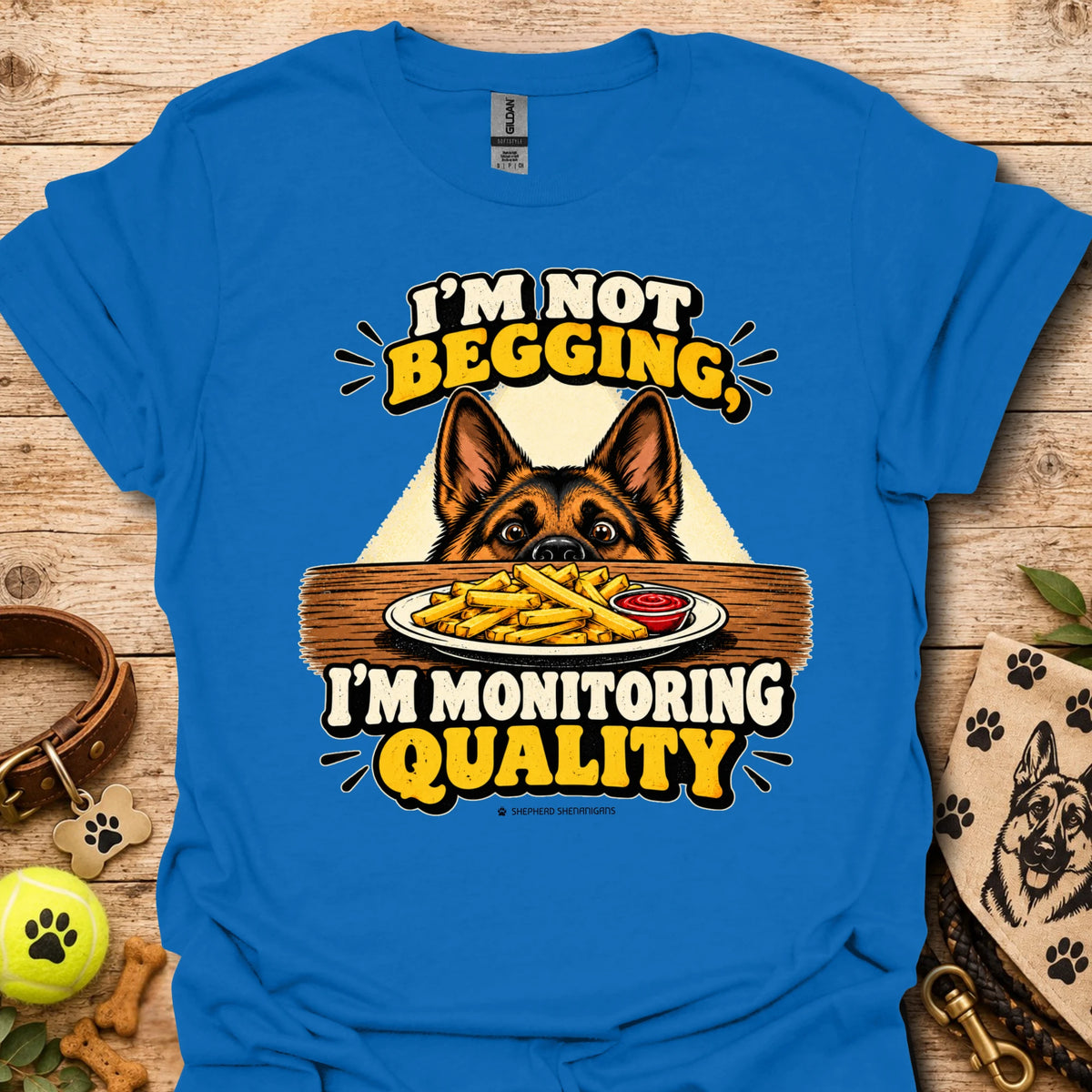 Royal blue t-shirt with dog head and “I'm Not Begging” front graphic, “I'm Monitoring Quality”
