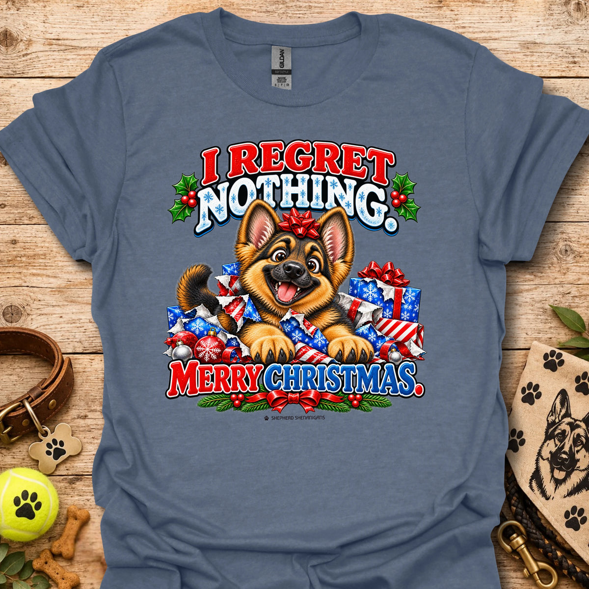 Dog Christmas graphic t-shirt, blue with colorful “I REGRET NOTHING” and “MERRY CHRISTMAS”