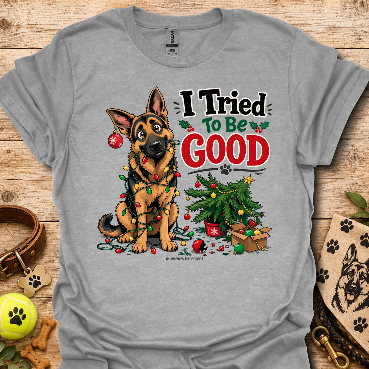 Heather gray T-shirt with cartoon German shepherd and “I Tried To Be Good” holiday graphic
