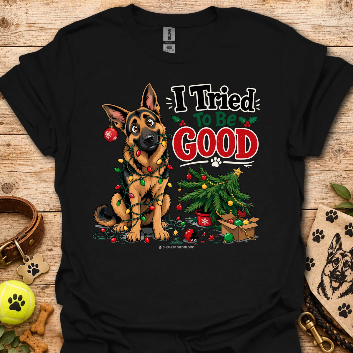 Black T-shirt with cartoon German shepherd and “I Tried To Be Good” holiday graphic