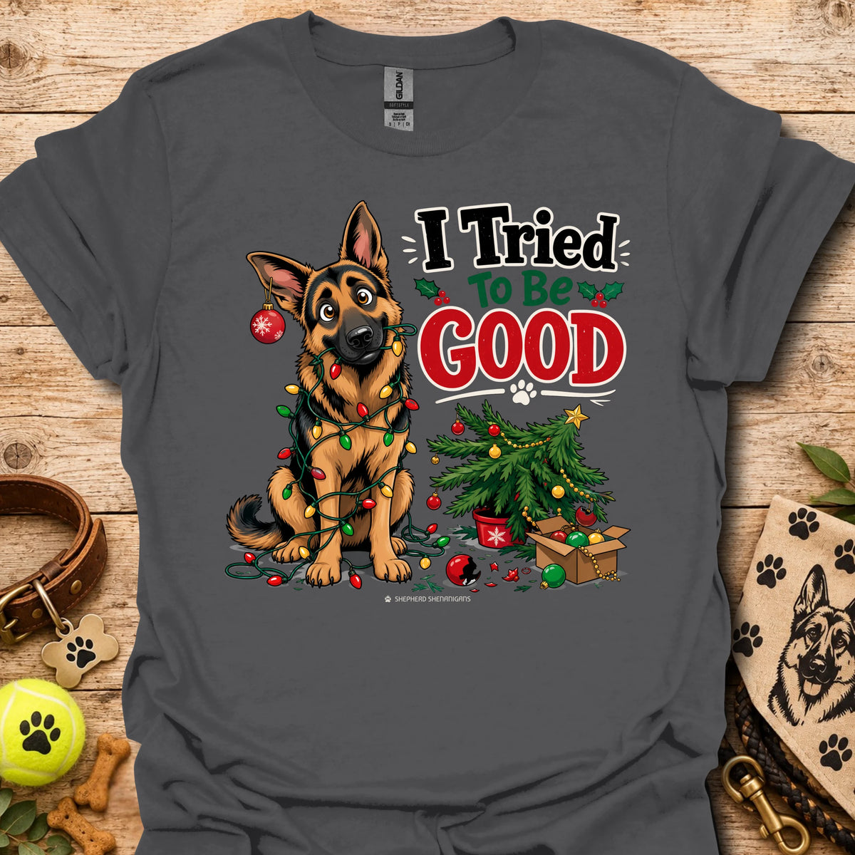 Charcoal T-shirt with cartoon German shepherd and “I Tried To Be Good” holiday graphic