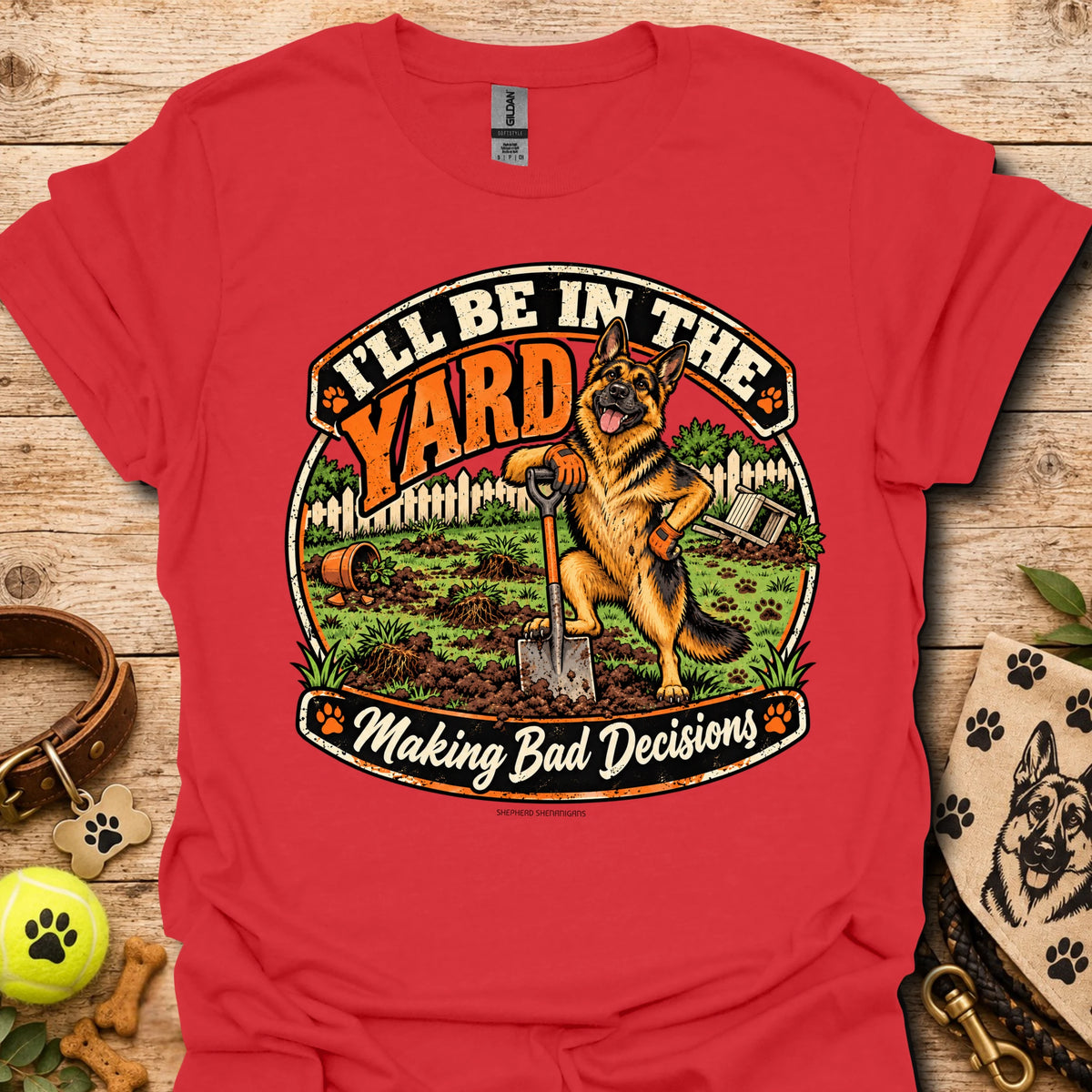 Red T-shirt with round yard scene graphic and German shepherd illustration