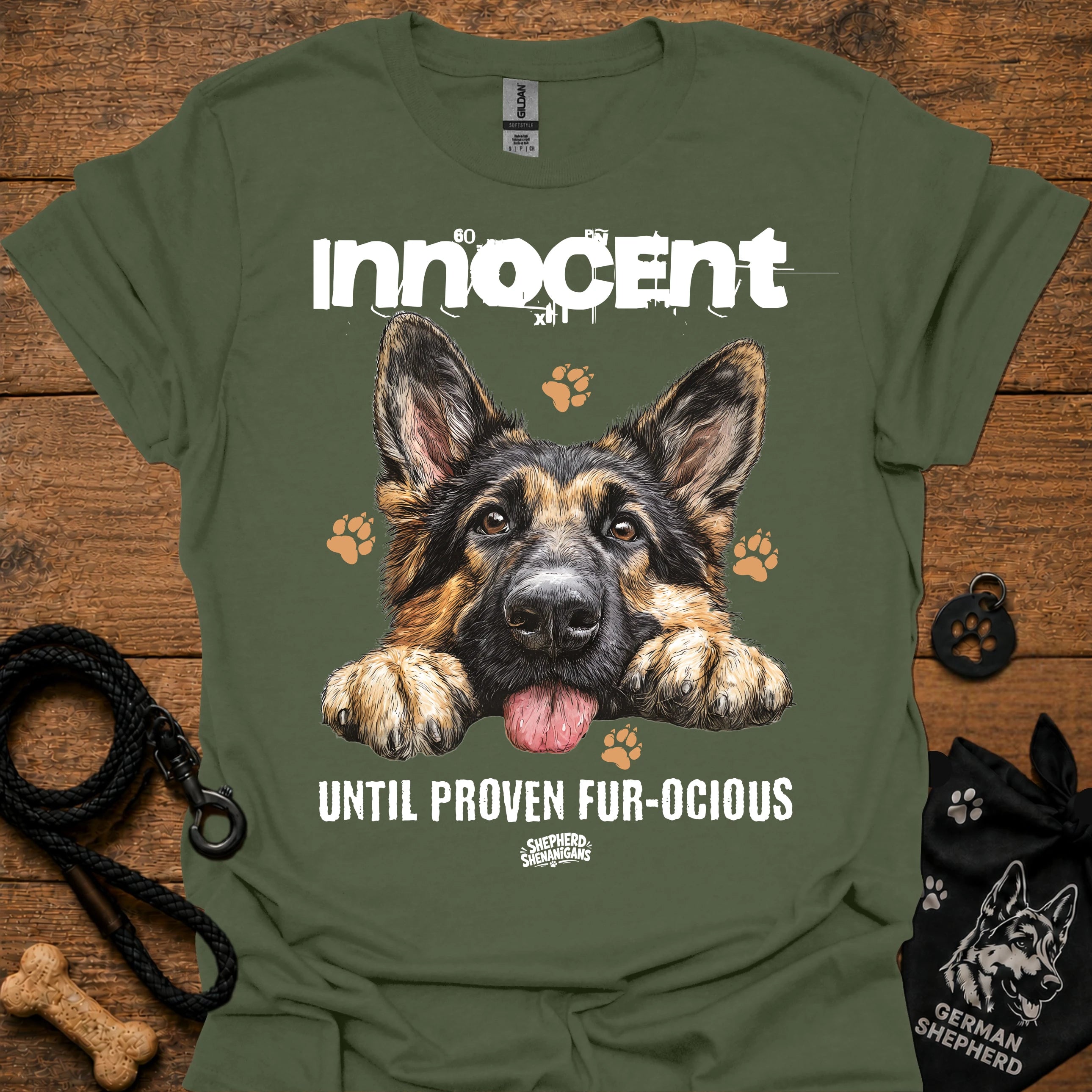 Graphic T-shirt with German shepherd and "innocent until proven fur-ocious" slogan
