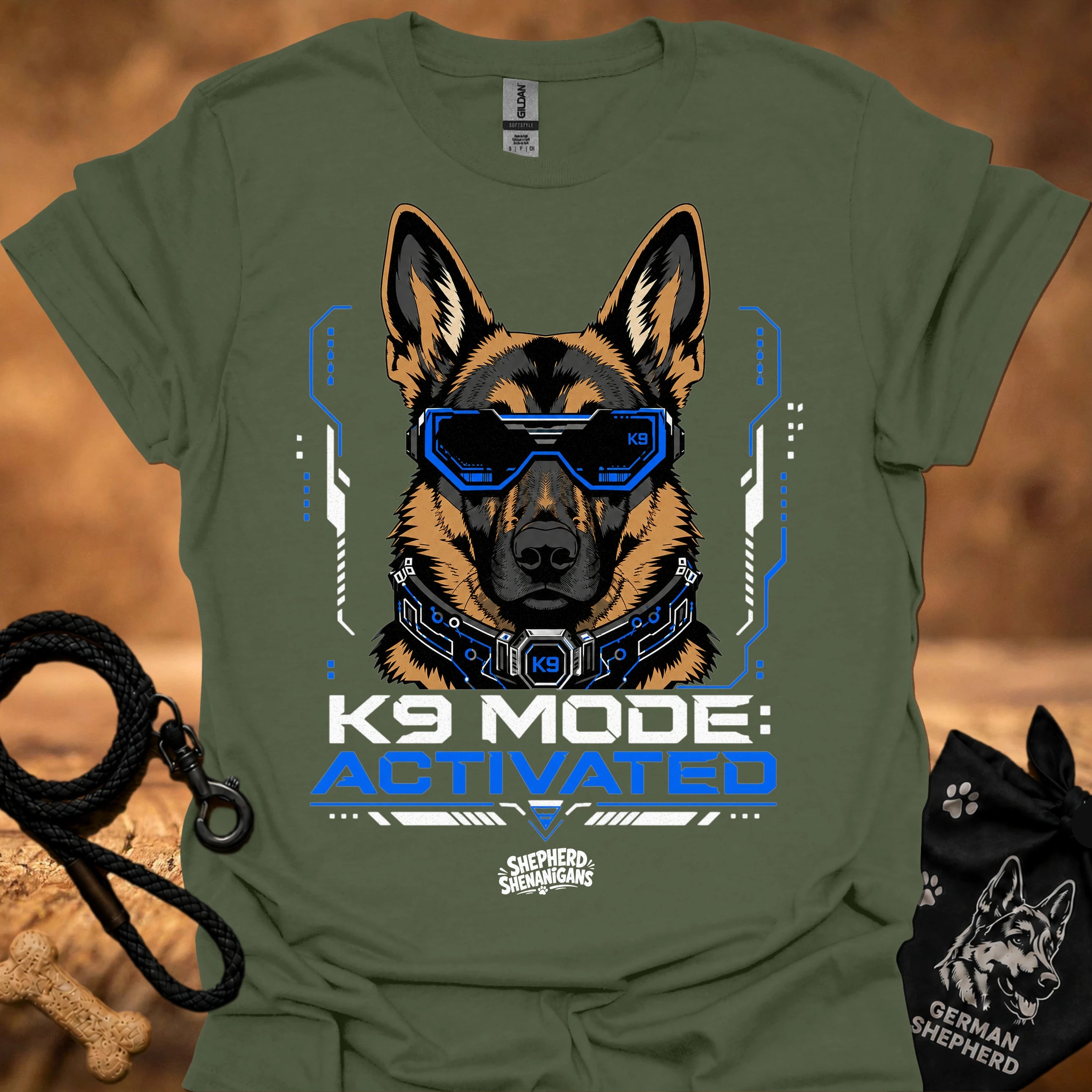 Military green K9-themed graphic t-shirt with German shepherd head and blue visor print