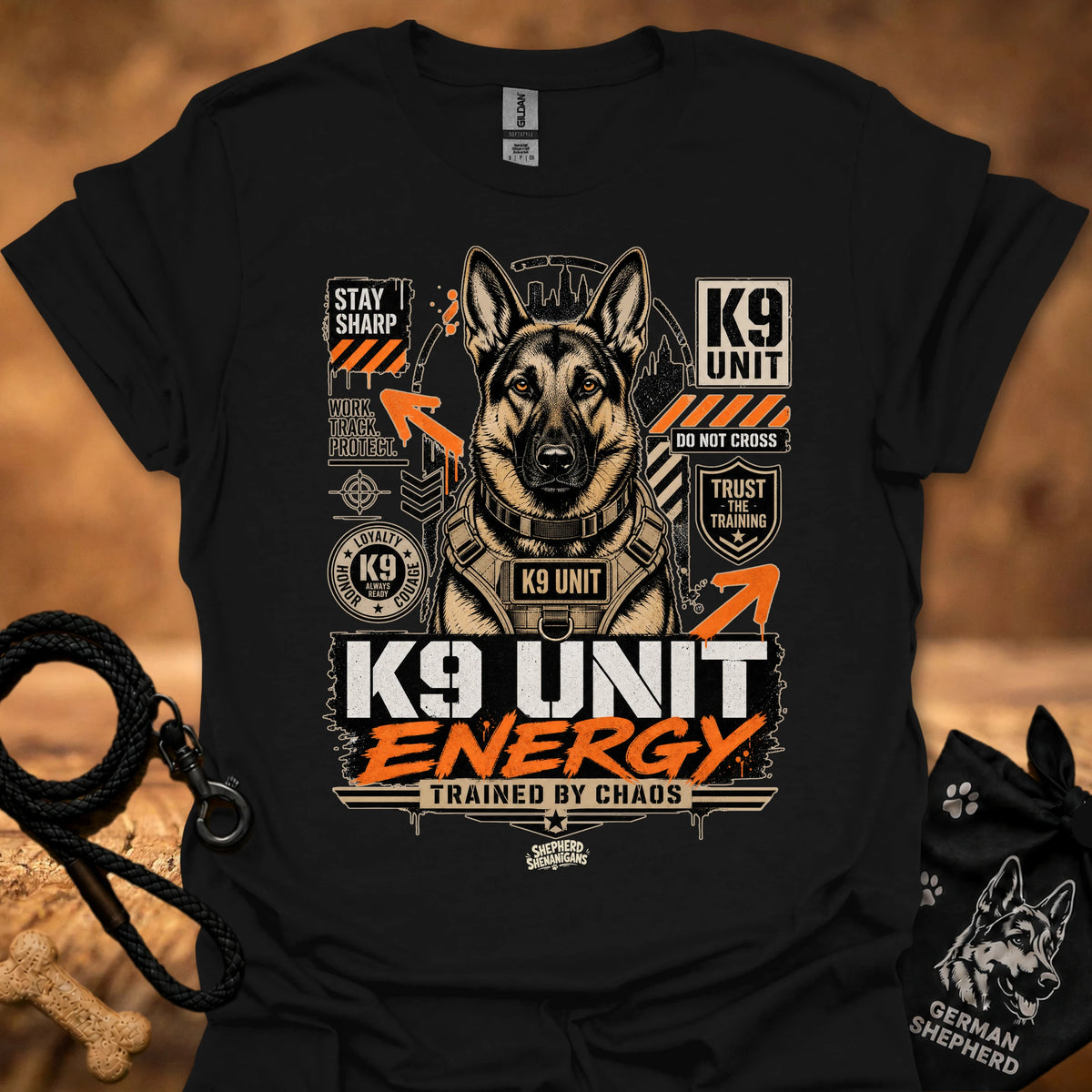 K9 Unit Energy T-shirt in Black with K9 Unit dog graphic and 'trained by chaos' text.