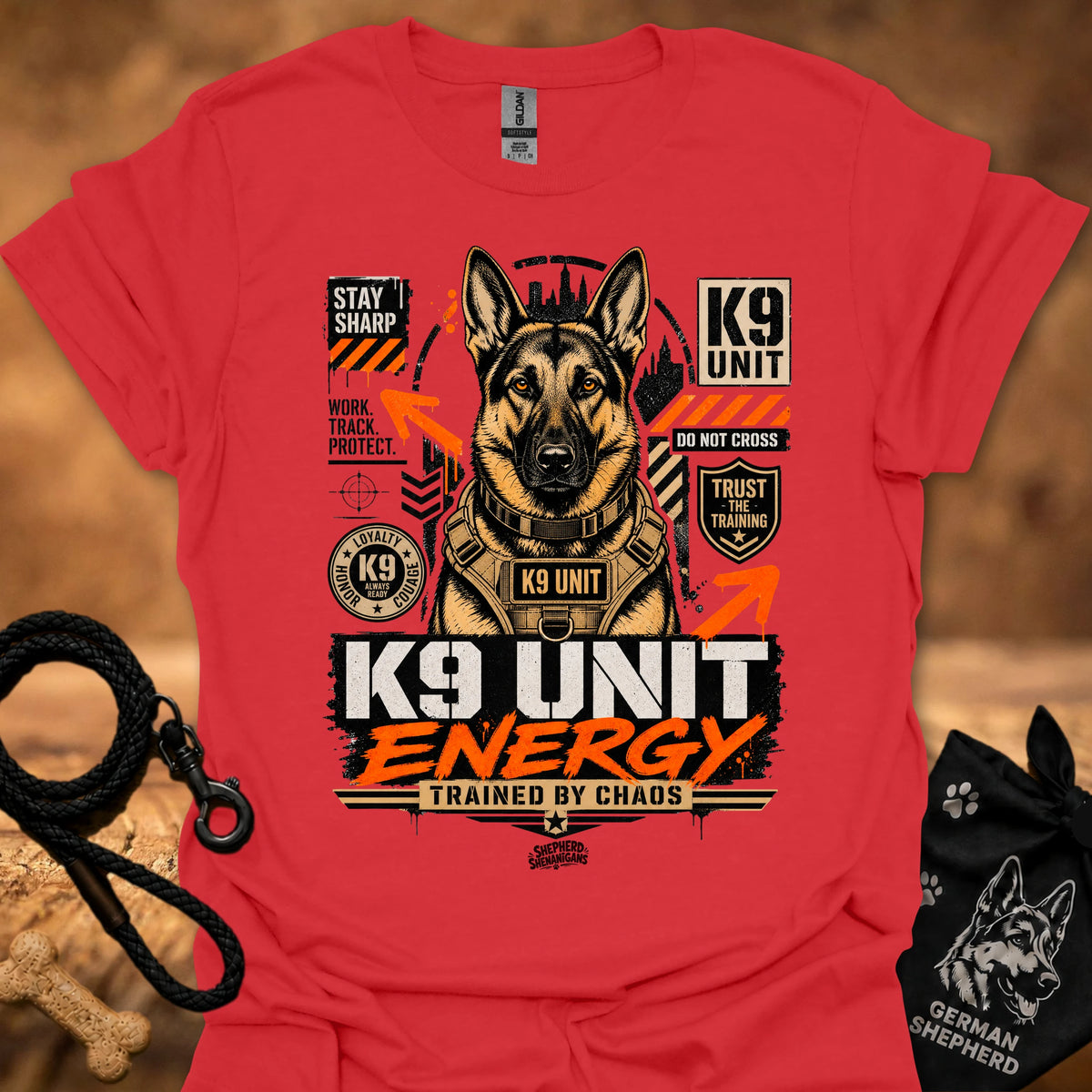 K9 Unit Energy T-shirt in Red with K9 Unit dog graphic and 'trained by chaos' print.