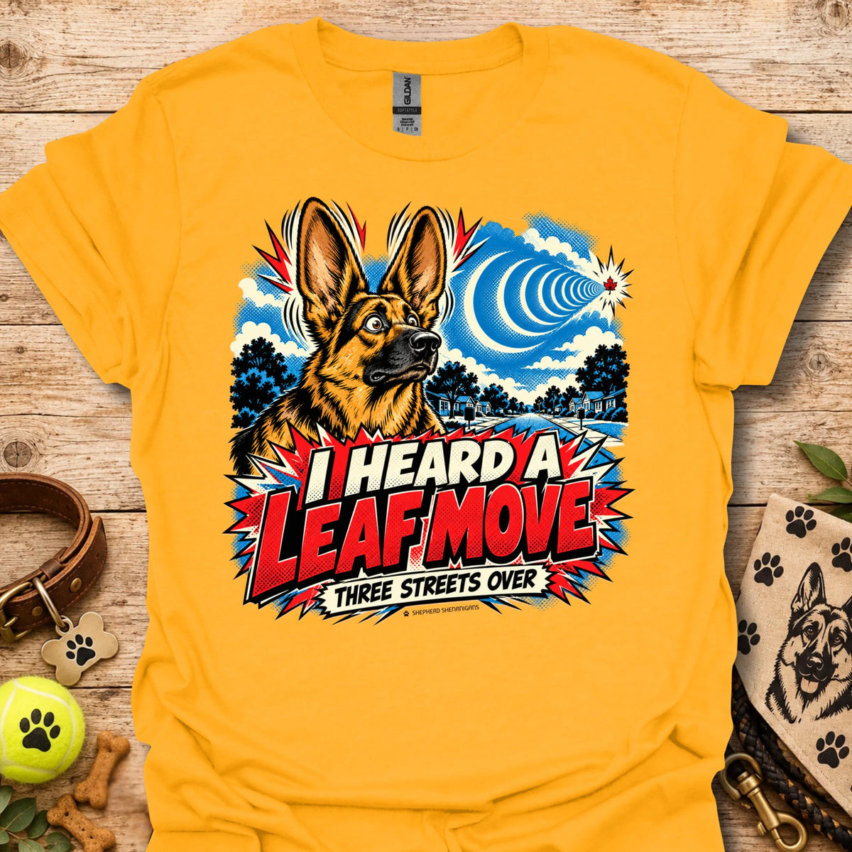 Gold crewneck T-shirt with German shepherd leaf comic graphic