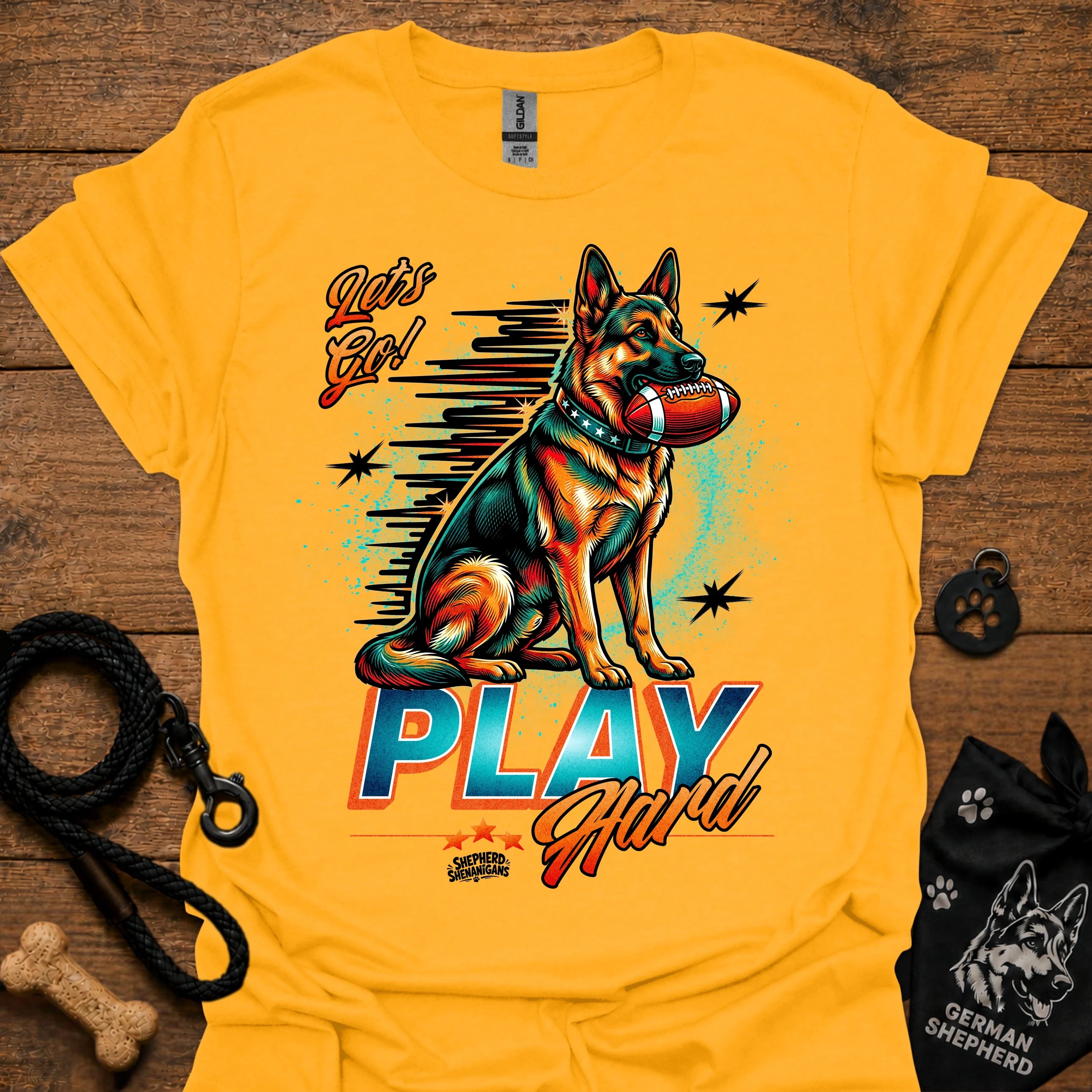 Gold dog graphic t-shirt with "PLAY" text and sitting German shepherd illustration