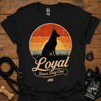 Black dog silhouette graphic T-shirt with vintage-style badge emblem