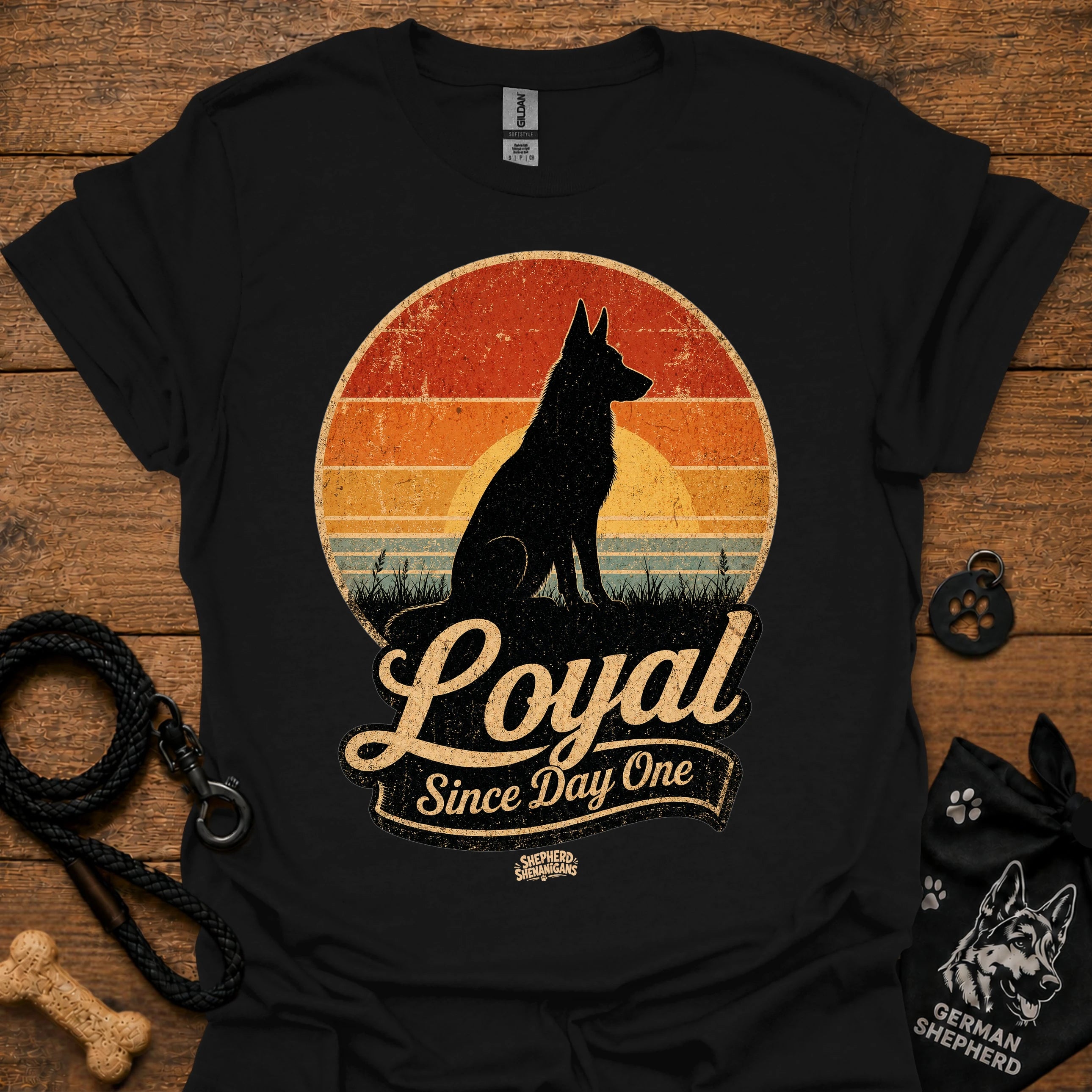 Black dog silhouette graphic T-shirt with vintage-style badge emblem