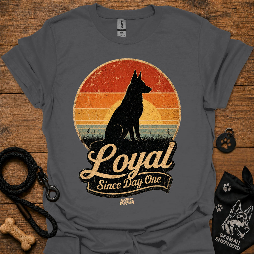 Charcoal gray dog silhouette graphic T-shirt with vintage-style badge emblem