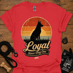Red dog silhouette graphic T-shirt with vintage-style badge emblem
