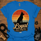 Royal blue dog silhouette graphic T-shirt with vintage-style badge emblem