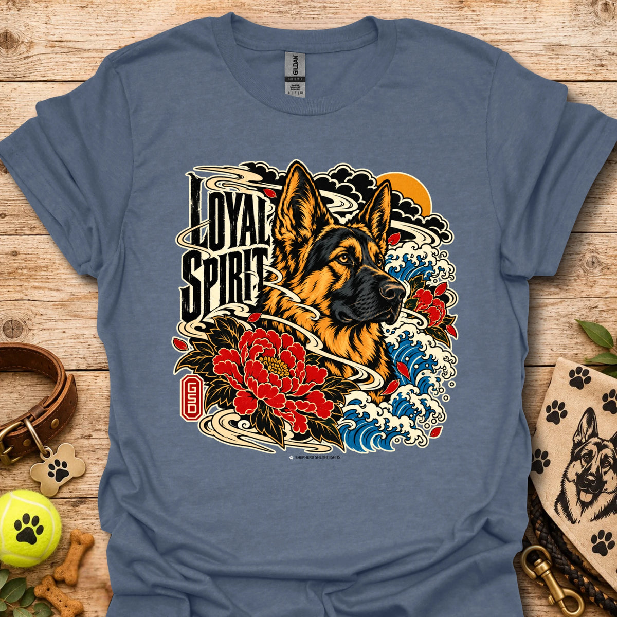 Heather indigo Loyal Spirit T-shirt with wolf, floral, and wave graphic on front