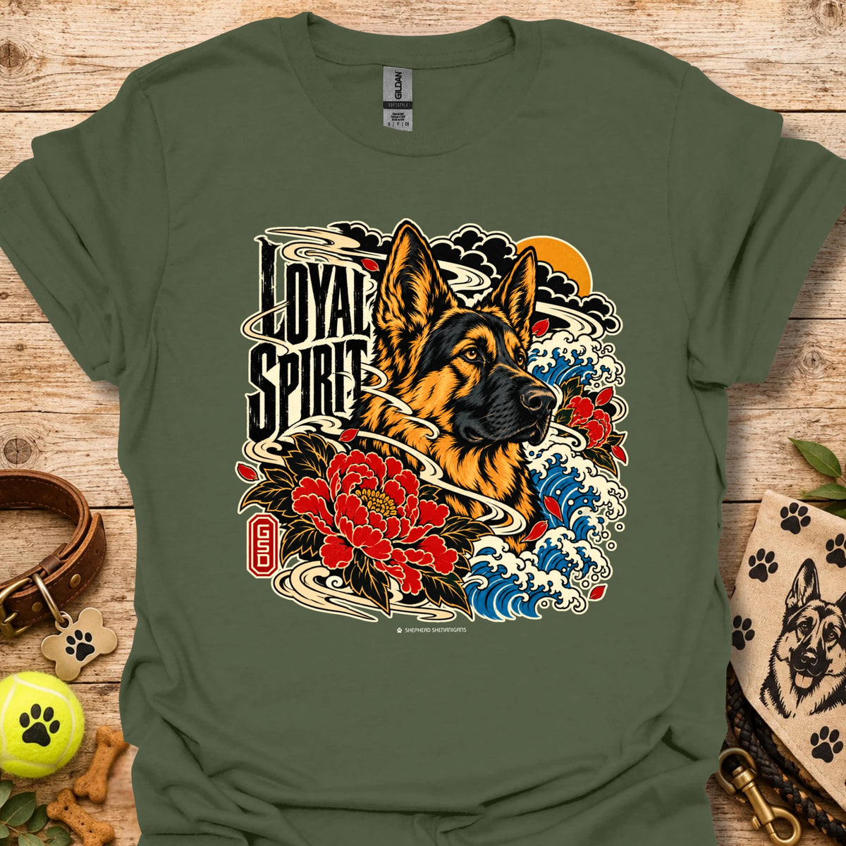 Military green Loyal Spirit T-shirt with wolf, floral, and wave graphic on front