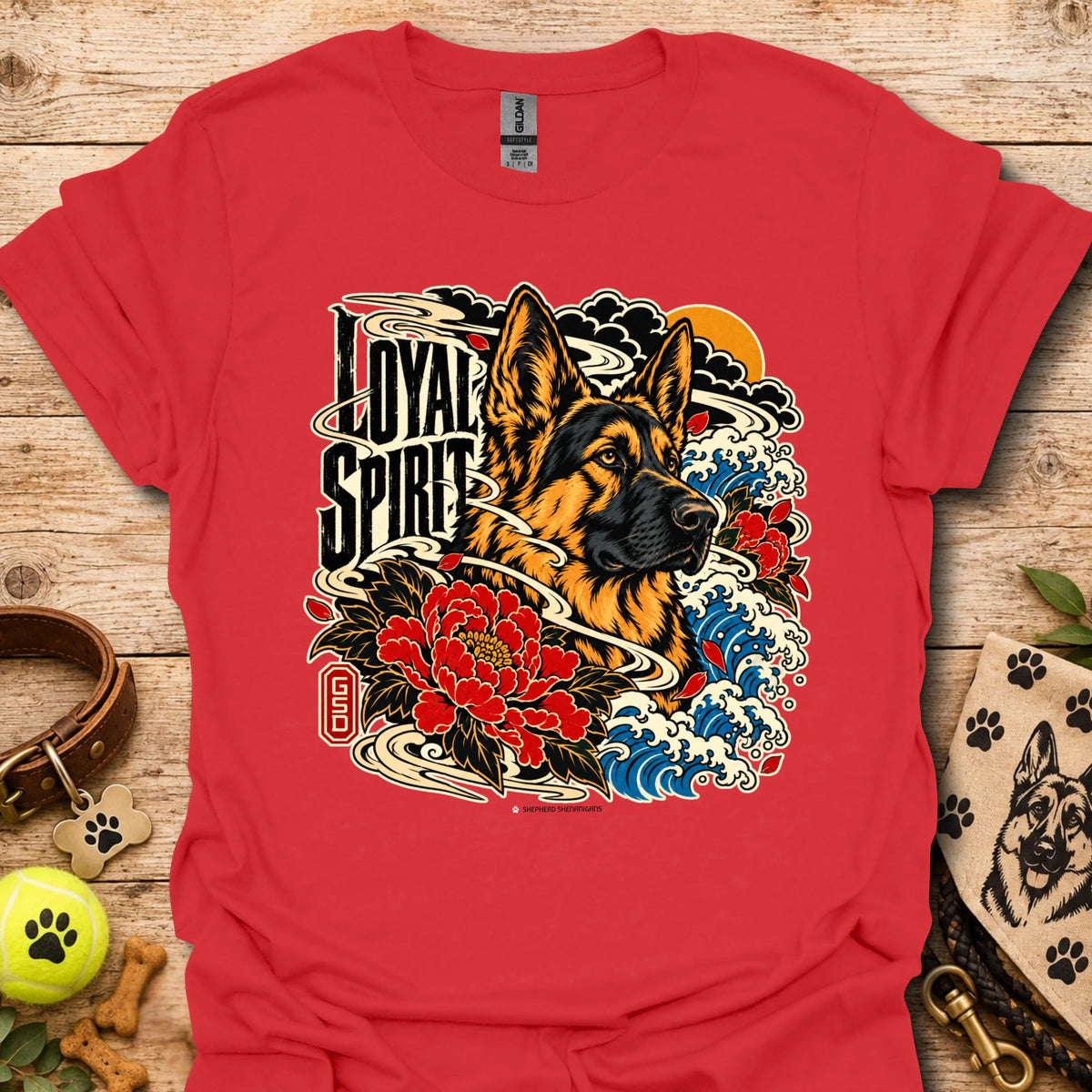 Red Loyal Spirit T-shirt with wolf, floral, and wave graphic on front