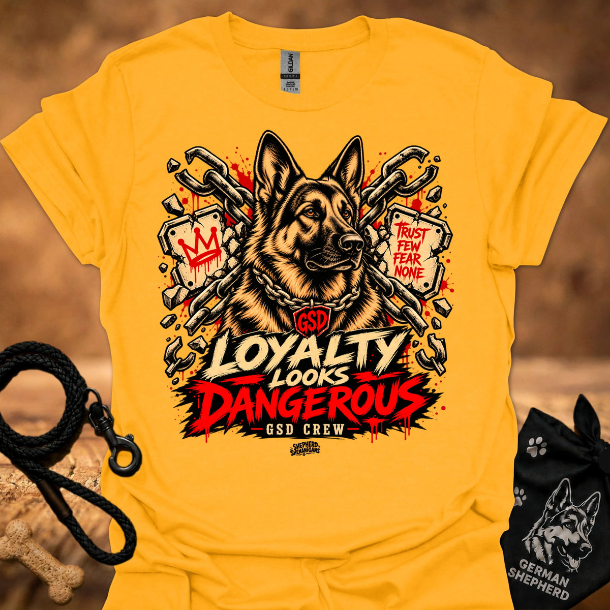 Gold graphic t-shirt with German shepherd and 'LOYALTY LOOKS DANGEROUS' print