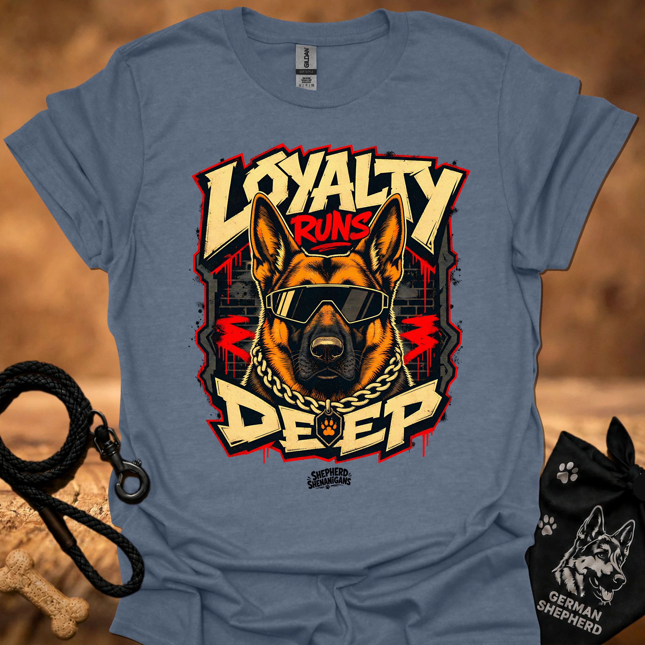 Light blue t-shirt with centered German shepherd wearing goggles and gold chain graphic