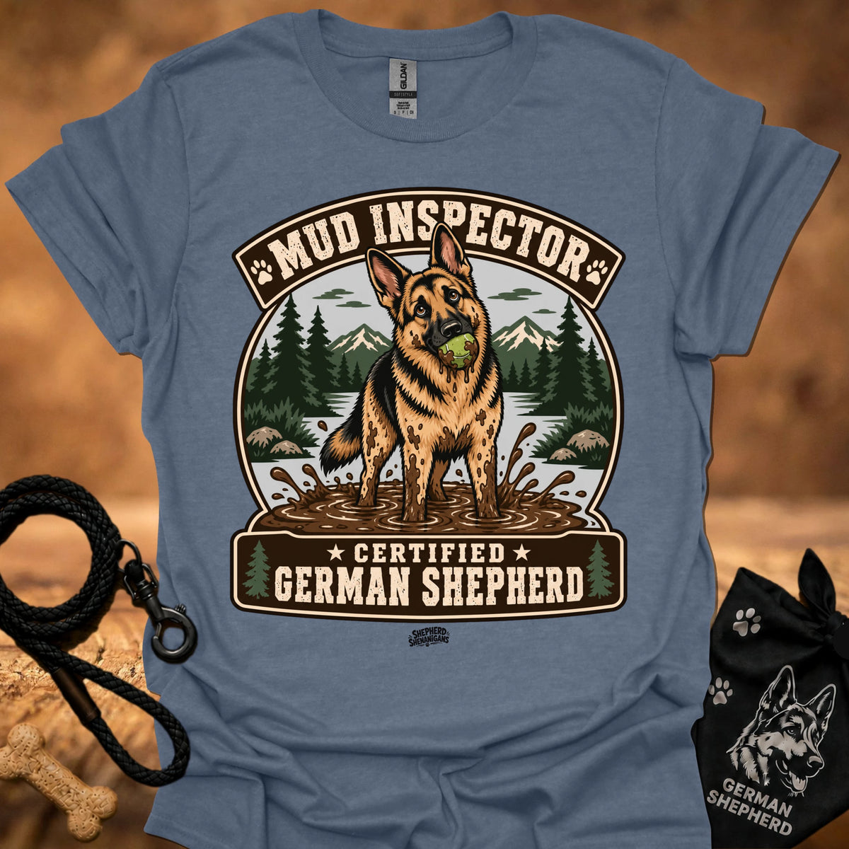 Heather blue T-shirt with chest graphic of German shepherd and Mud Inspector badge