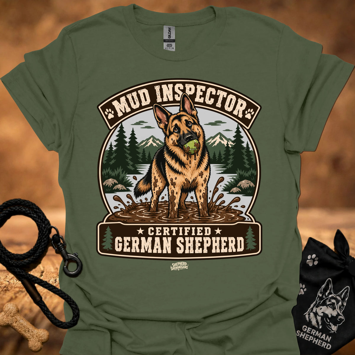 Military green T-shirt with chest graphic of German shepherd and Mud Inspector badge