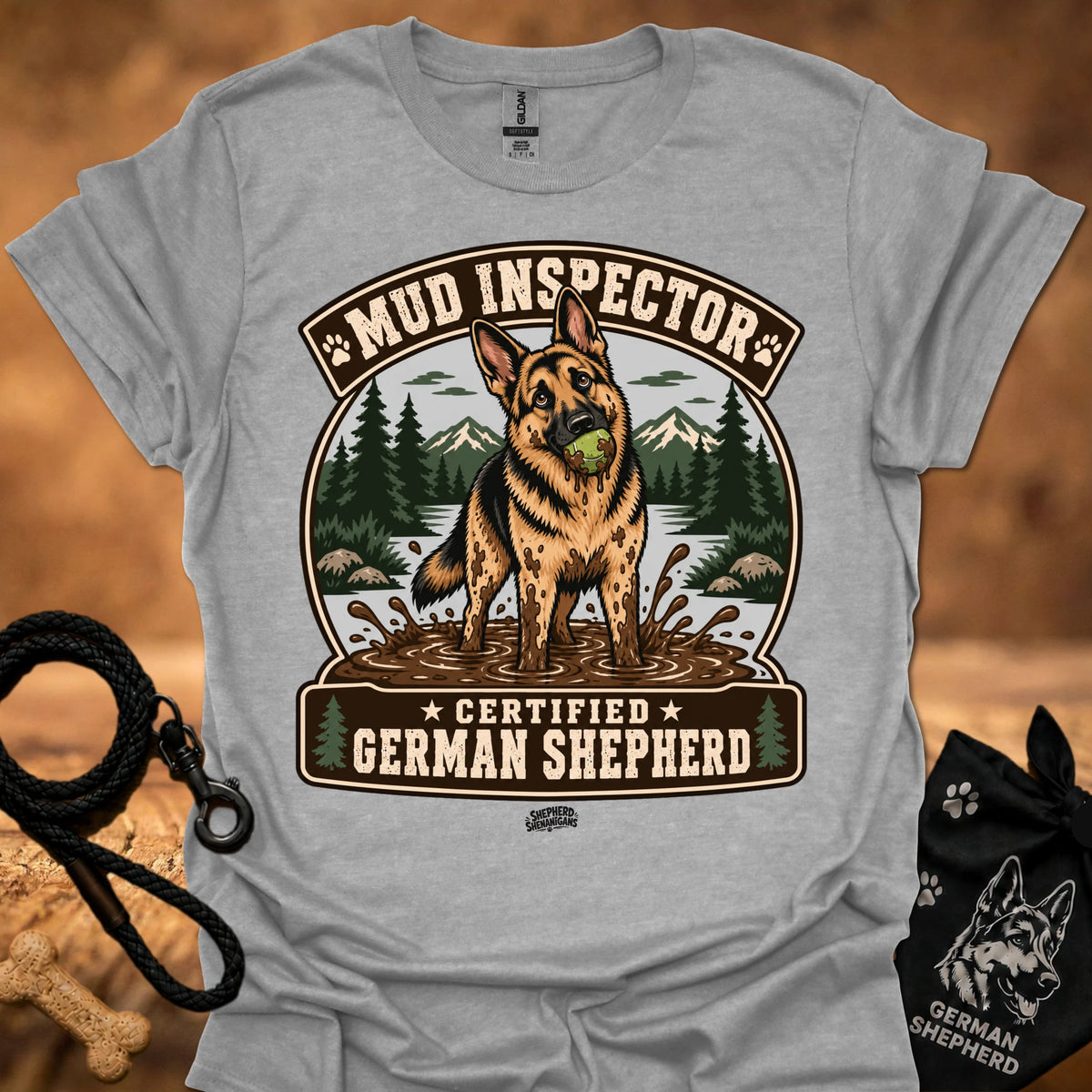 Heather gray T-shirt with chest graphic of German shepherd and Mud Inspector badge