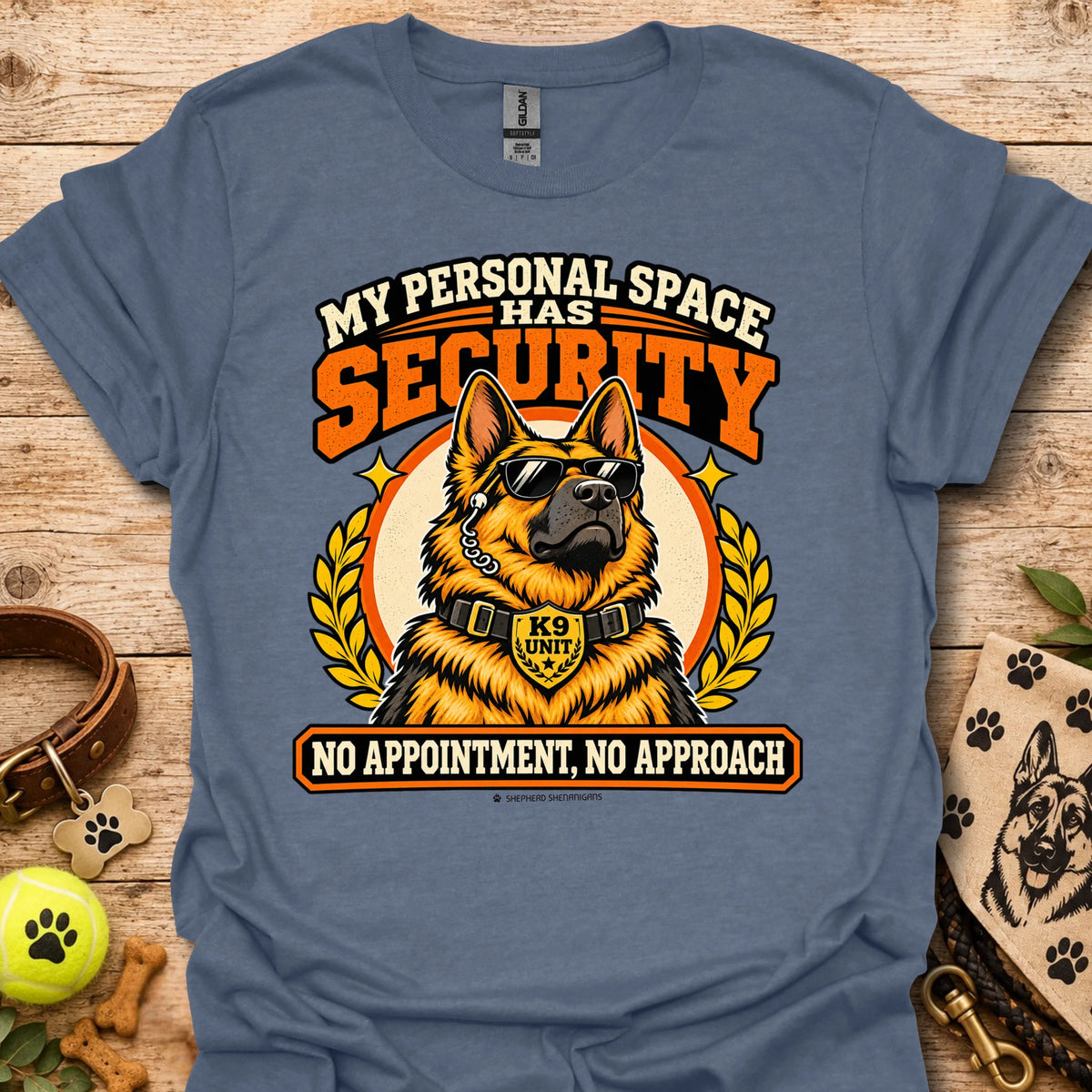 Heather indigo T-shirt with a German shepherd security graphic and bold lettering.