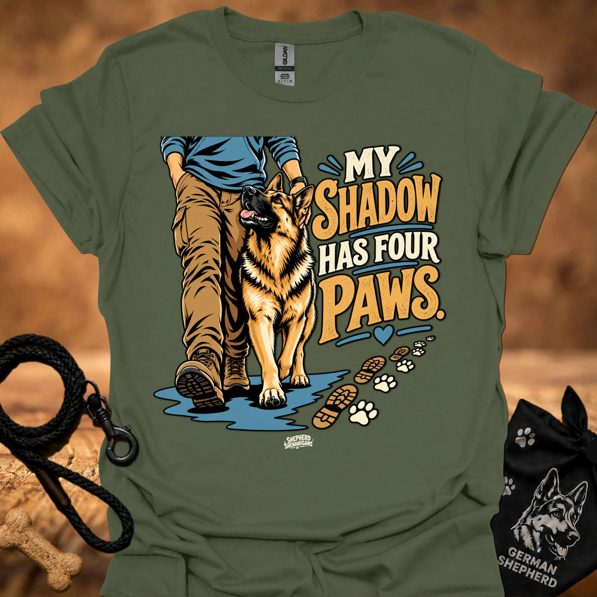 Military green T-shirt with dog graphic and “My Shadow Has Four Paws” text