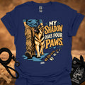 Royal blue T-shirt with dog graphic and “My Shadow Has Four Paws” text
