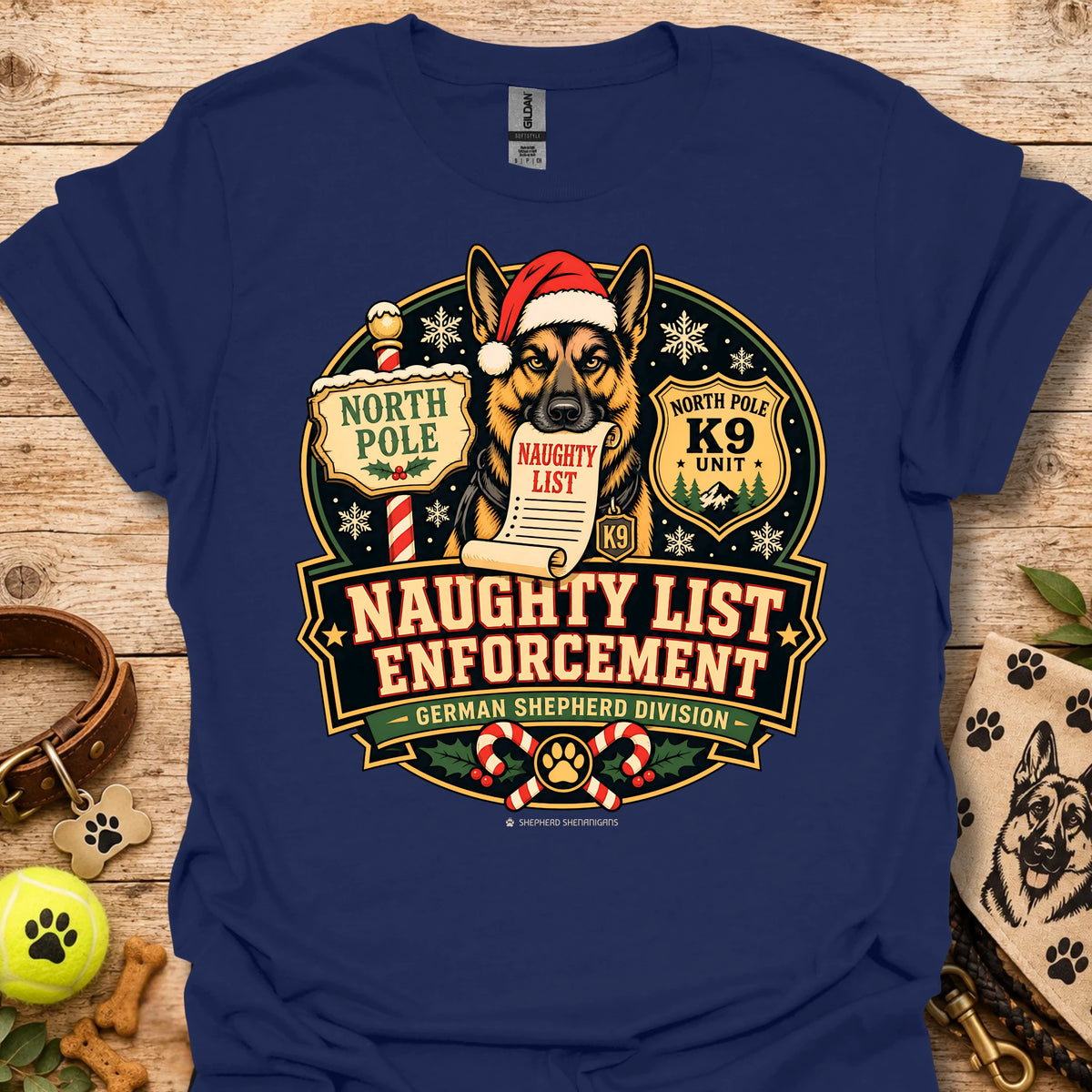 Navy T-shirt with holiday dog badge graphic, Santa hat and paw print details