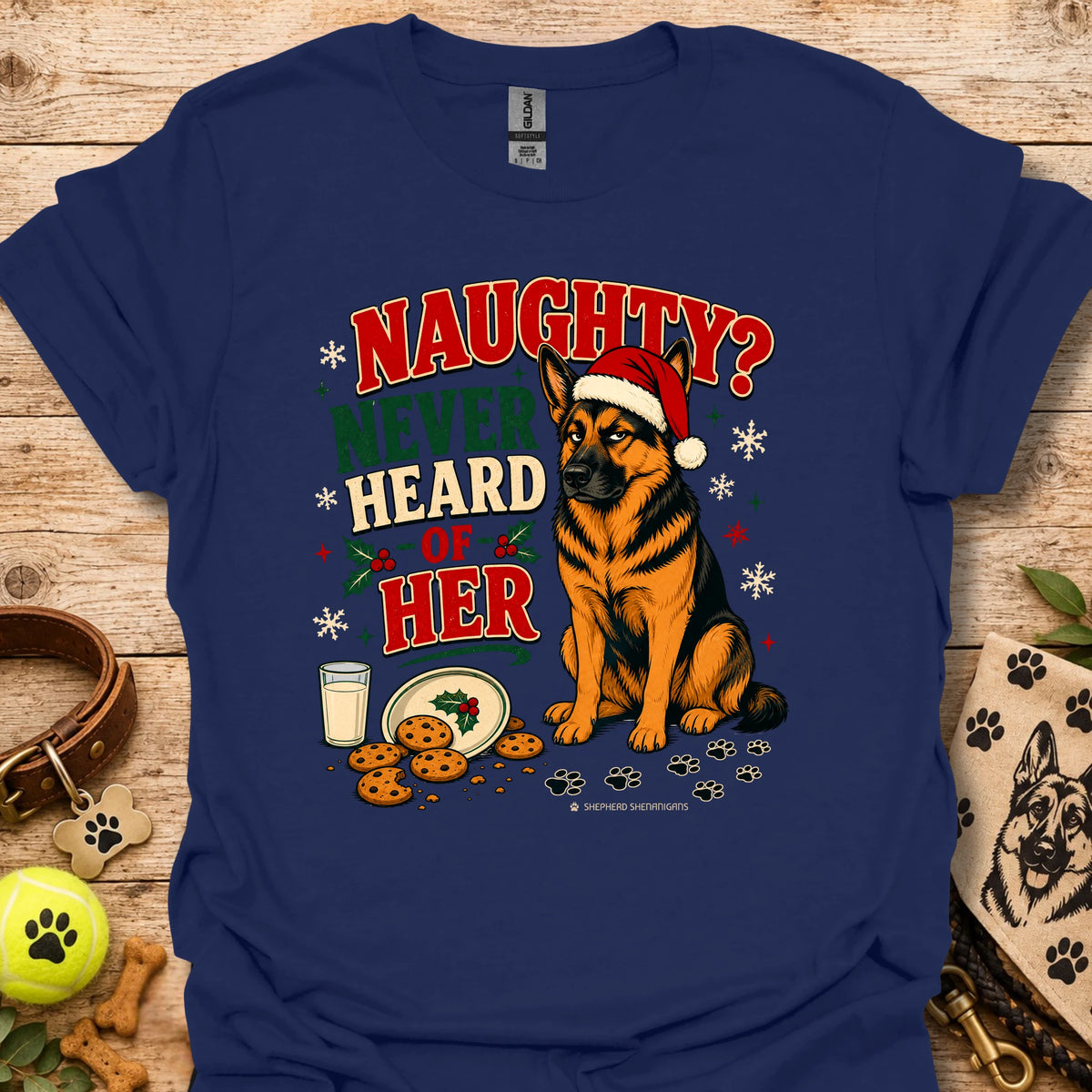 Navy graphic t-shirt with dog in Santa hat, cookies and 'Naughty? Never Heard of Her'