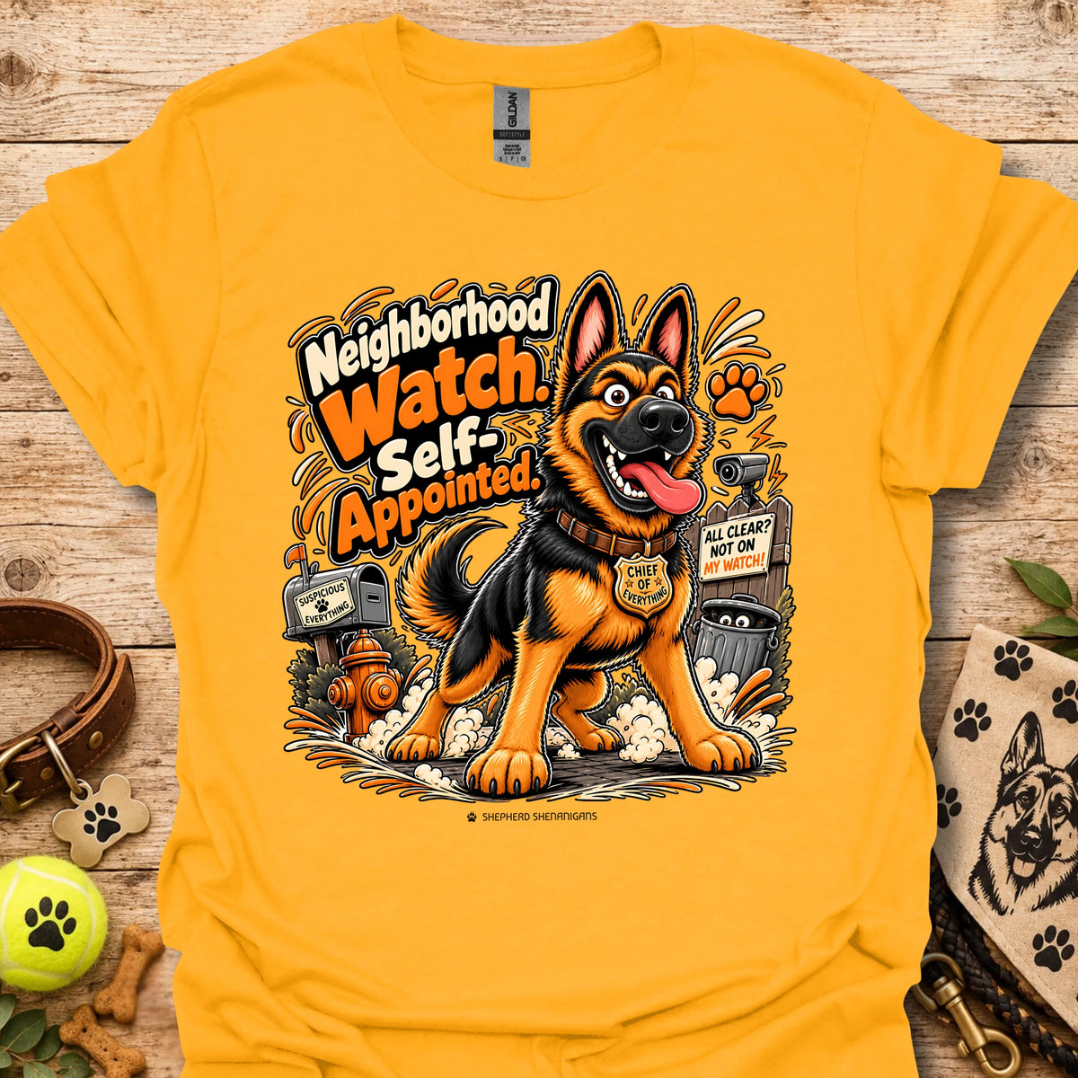 Gold crewneck T-shirt with smiling German shepherd graphic and orange text
