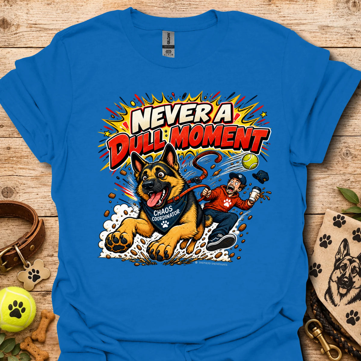 Royal blue T-shirt with colorful comic-style dog graphic on the front.