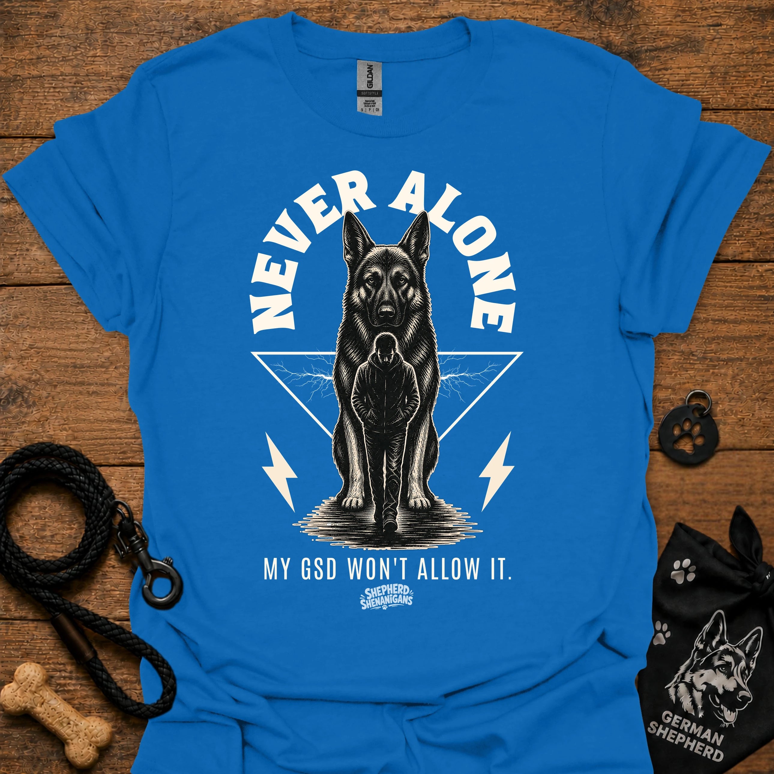 Royal blue T-shirt with German shepherd graphic and bold "Never Alone" text front