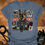 Blue-gray graphic t-shirt with German shepherd and text 'No Bad Dogs, Just Bad Vibes'.