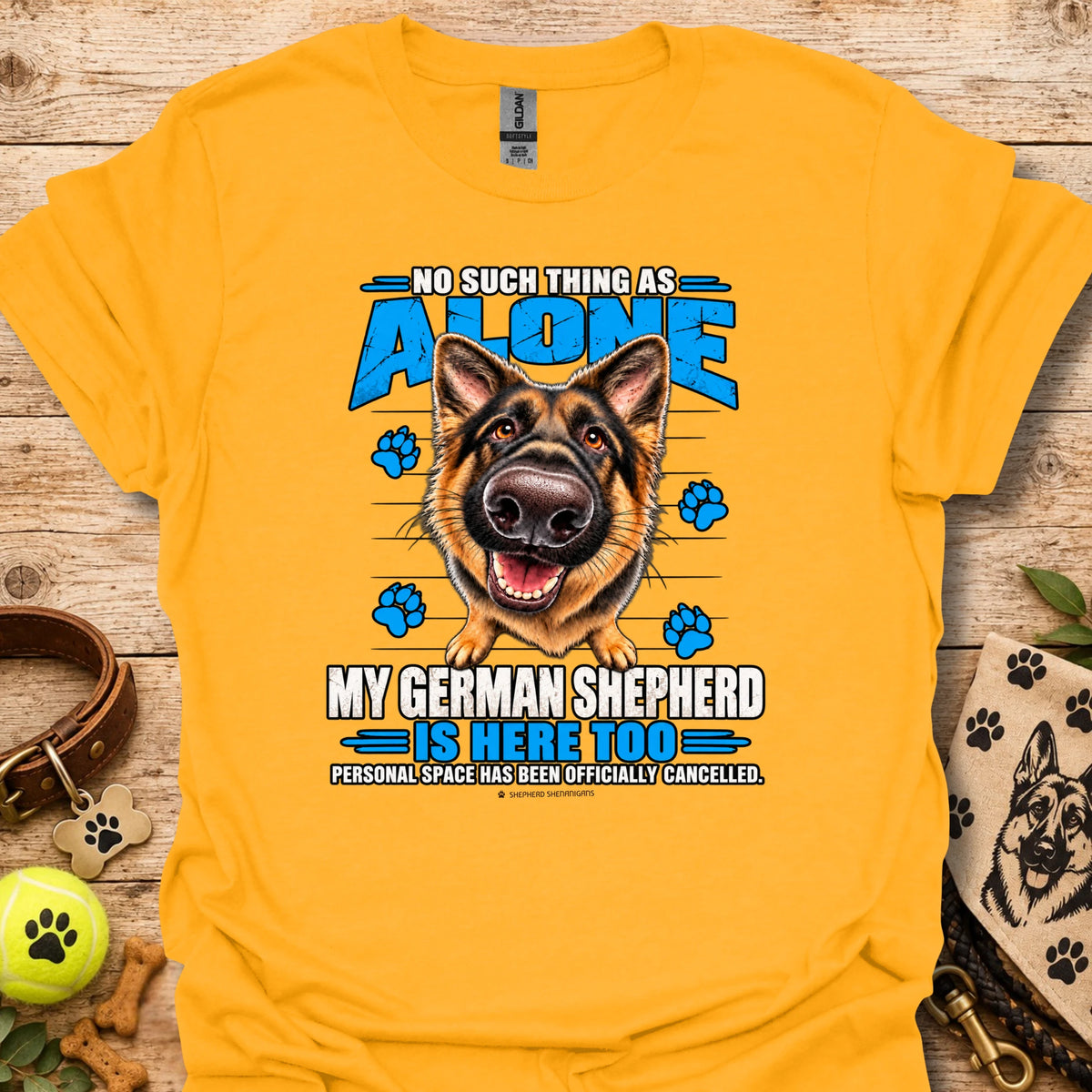 Gold T-shirt with German shepherd graphic and paw-print text