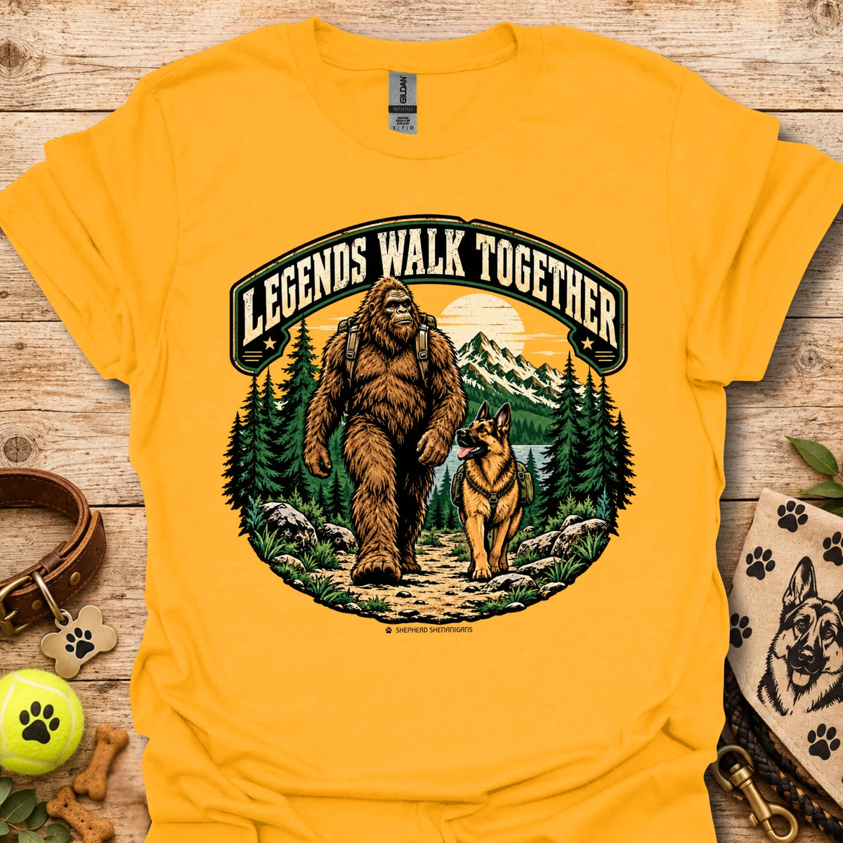Yellow T-shirt with circular graphic of a bear and dog in a forest