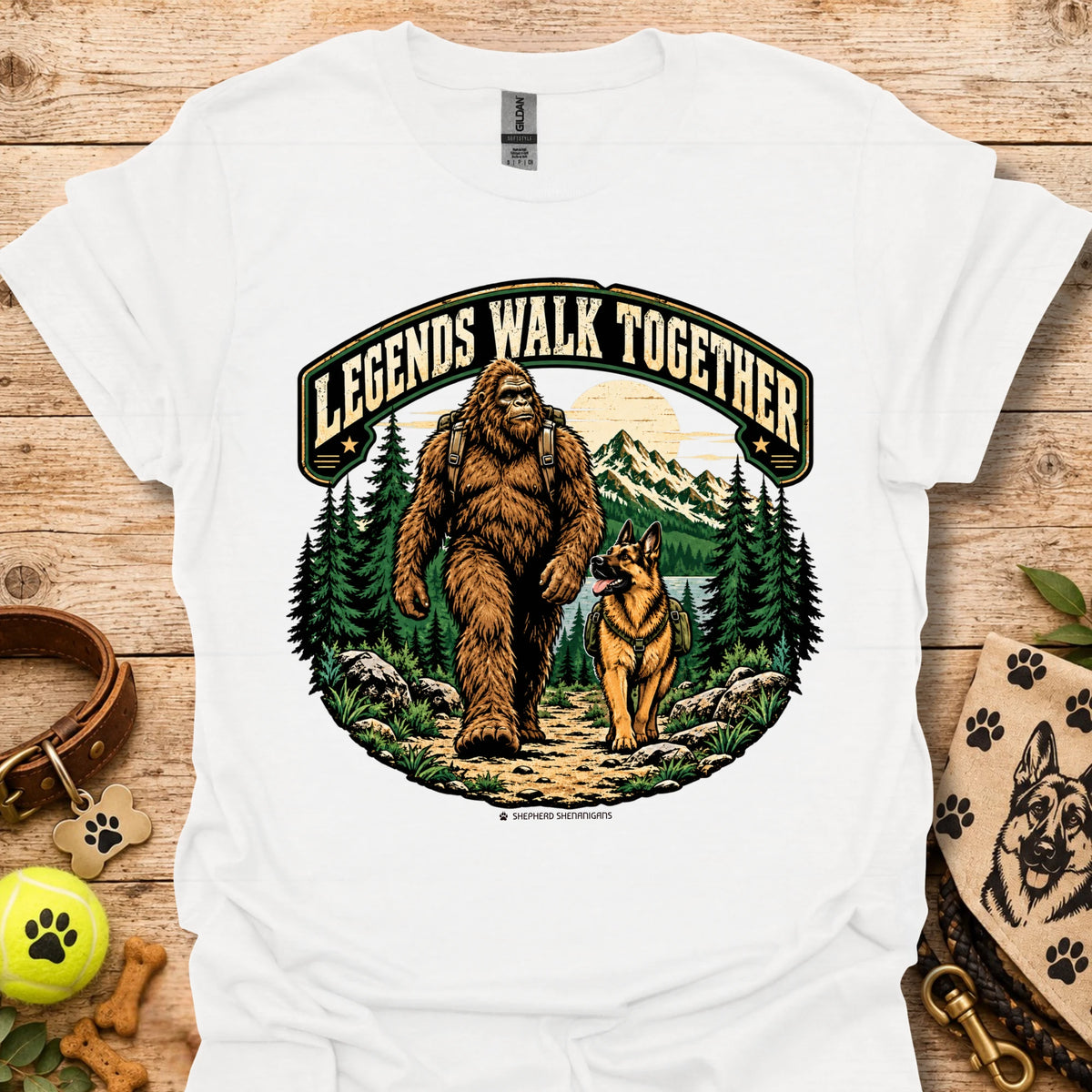 White T-shirt with circular bear and dog graphic surrounded by forest trees