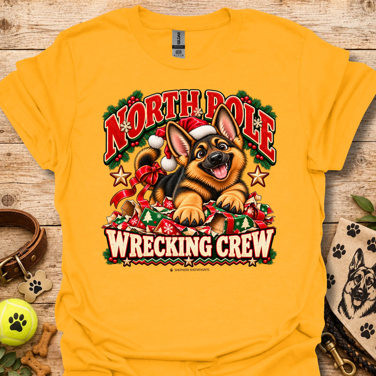 Gold crewneck T-shirt with holiday dog graphic and “WRECKING CREW” text