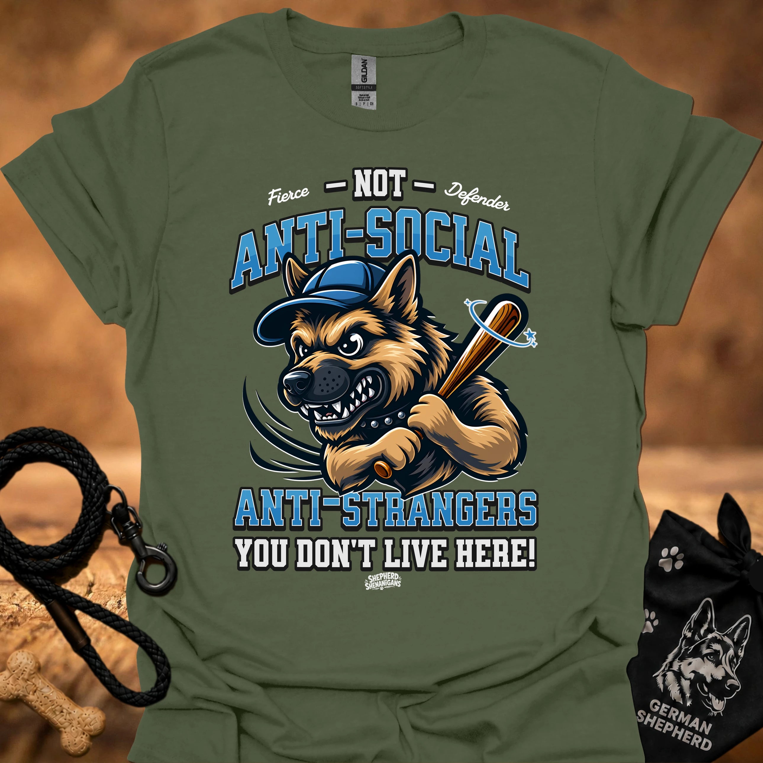 Olive green graphic T-shirt with snarling dog face, sword icon, and anti-social text