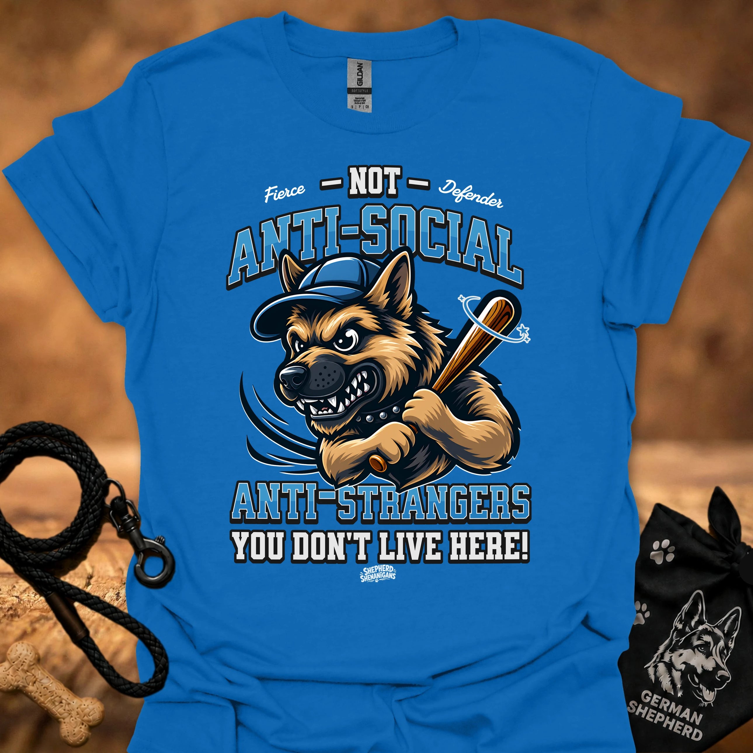 Royal blue graphic T-shirt with snarling dog and anti-social slogan in large type