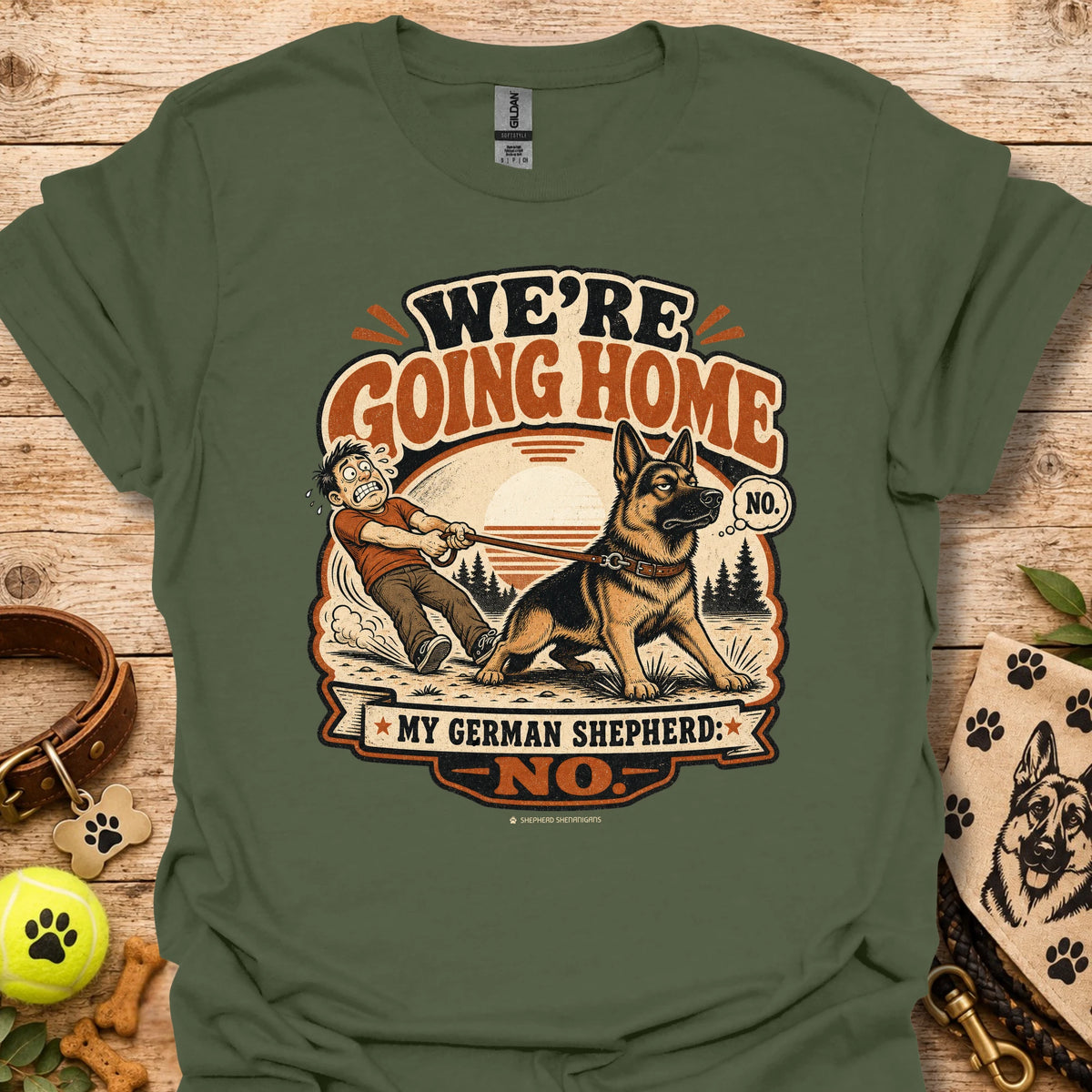 Military green T-shirt with German shepherd graphic and 'WE'RE GOING HOME' print