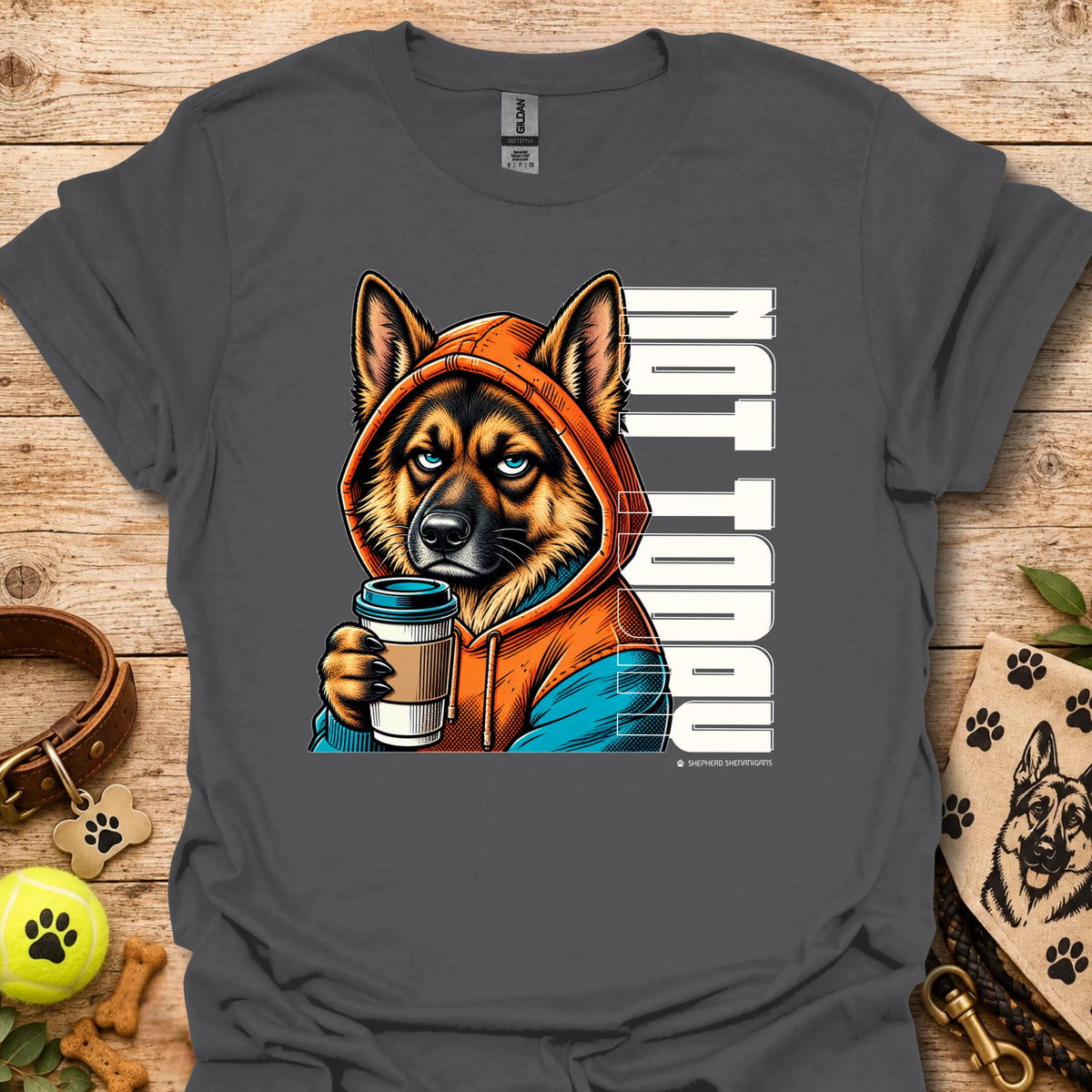 Charcoal crewneck t-shirt with orange dog holding coffee cup graphic.