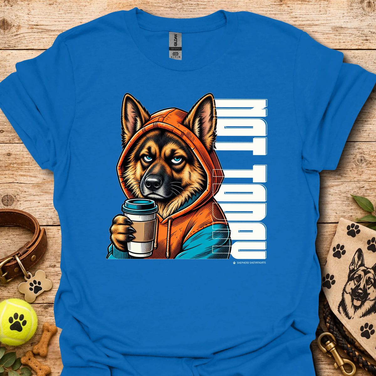 Royal blue crewneck t-shirt with orange dog holding coffee cup graphic.