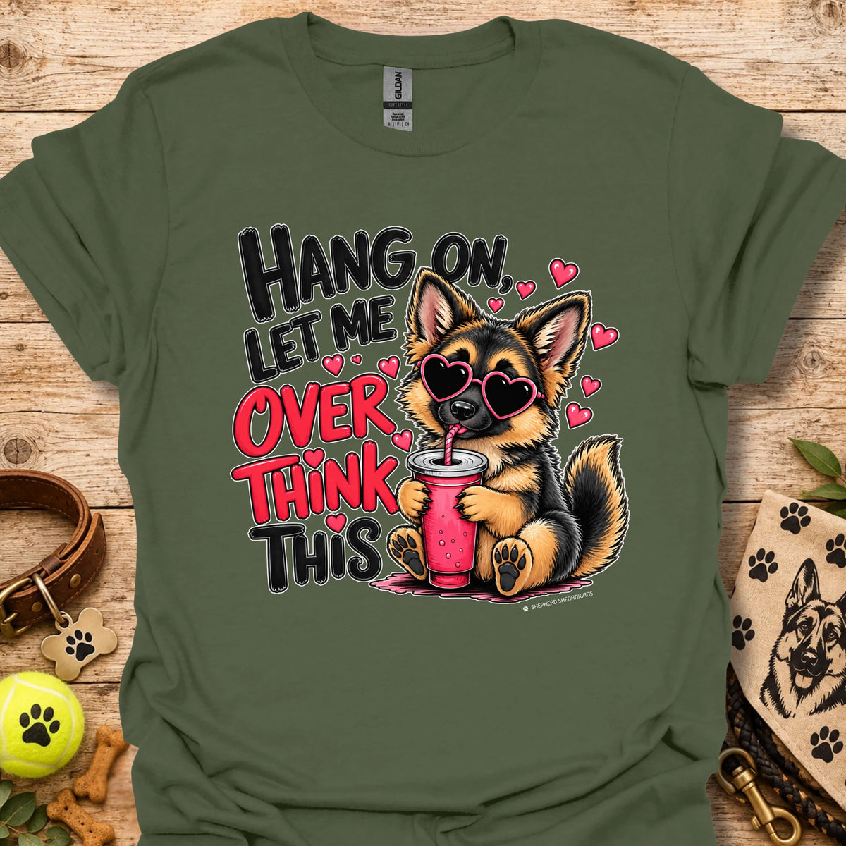 Green crewneck dog graphic t-shirt with “Hang on, let me overthink this” text and hearts