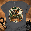 Charcoal gray women’s t-shirt with “Partners in Mud” dog and girl graphic