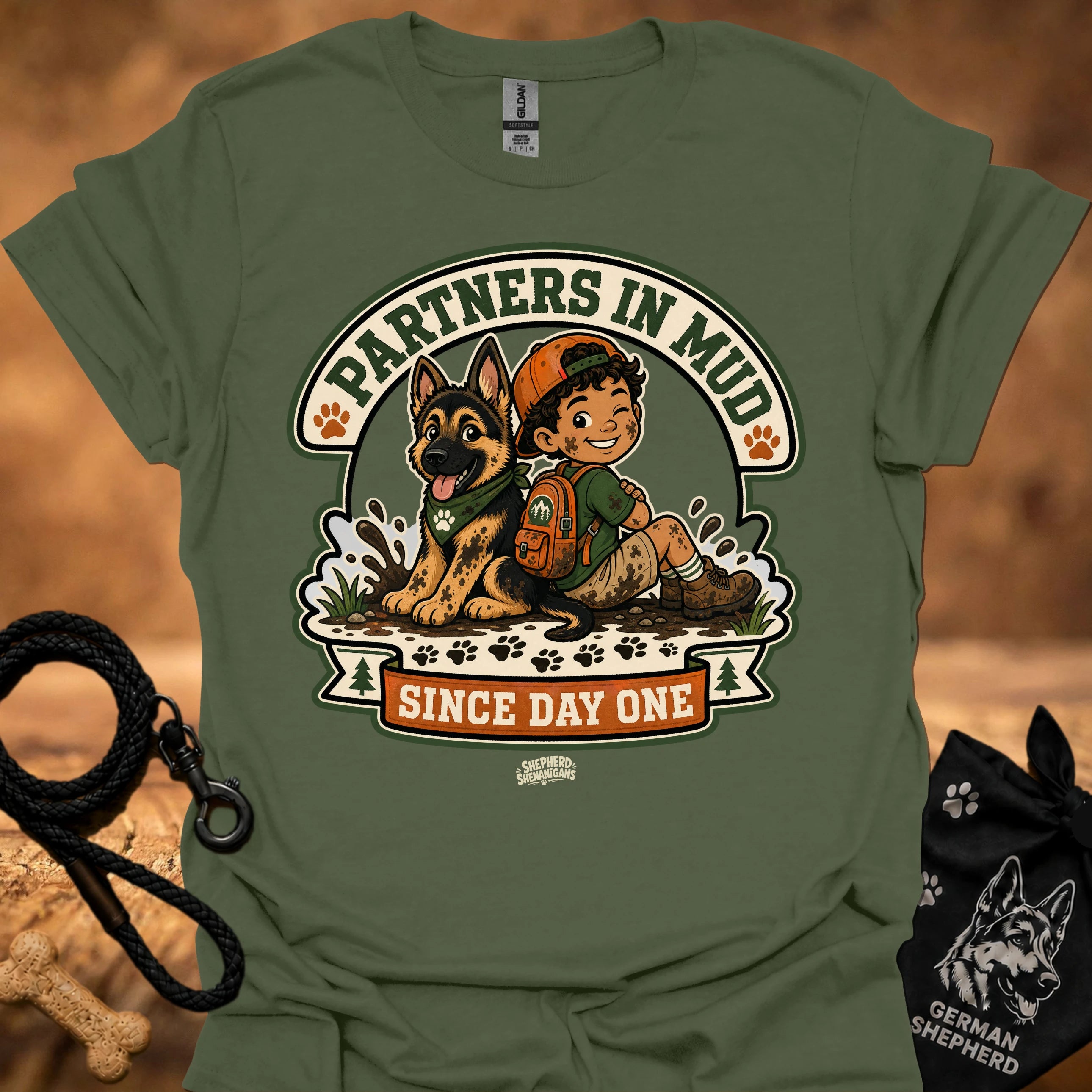 Military green men's t-shirt with circular dog and boy graphic, "Since Day One" print.