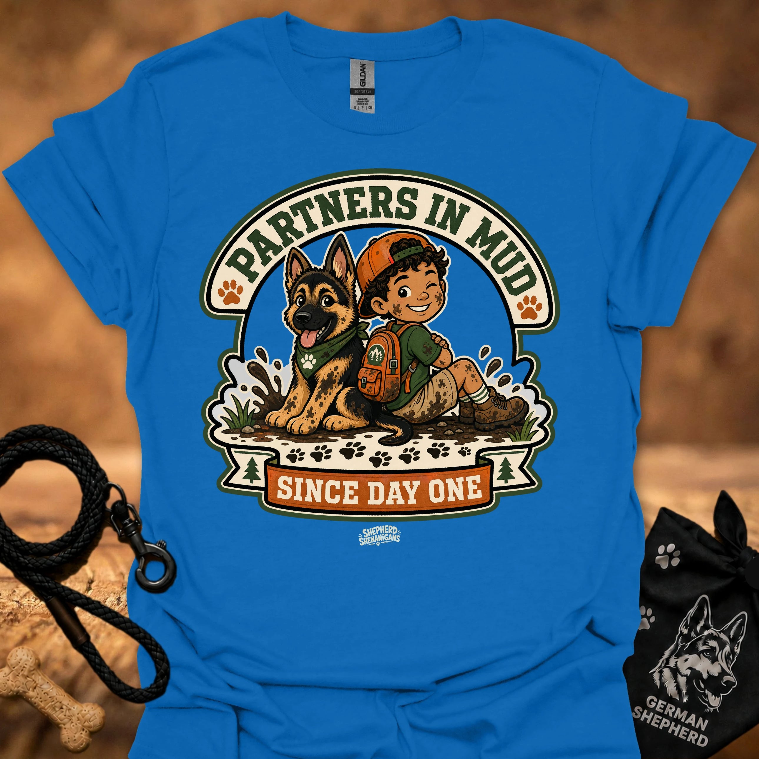 Royal blue men's t-shirt with circular dog and boy graphic, "Since Day One" print.
